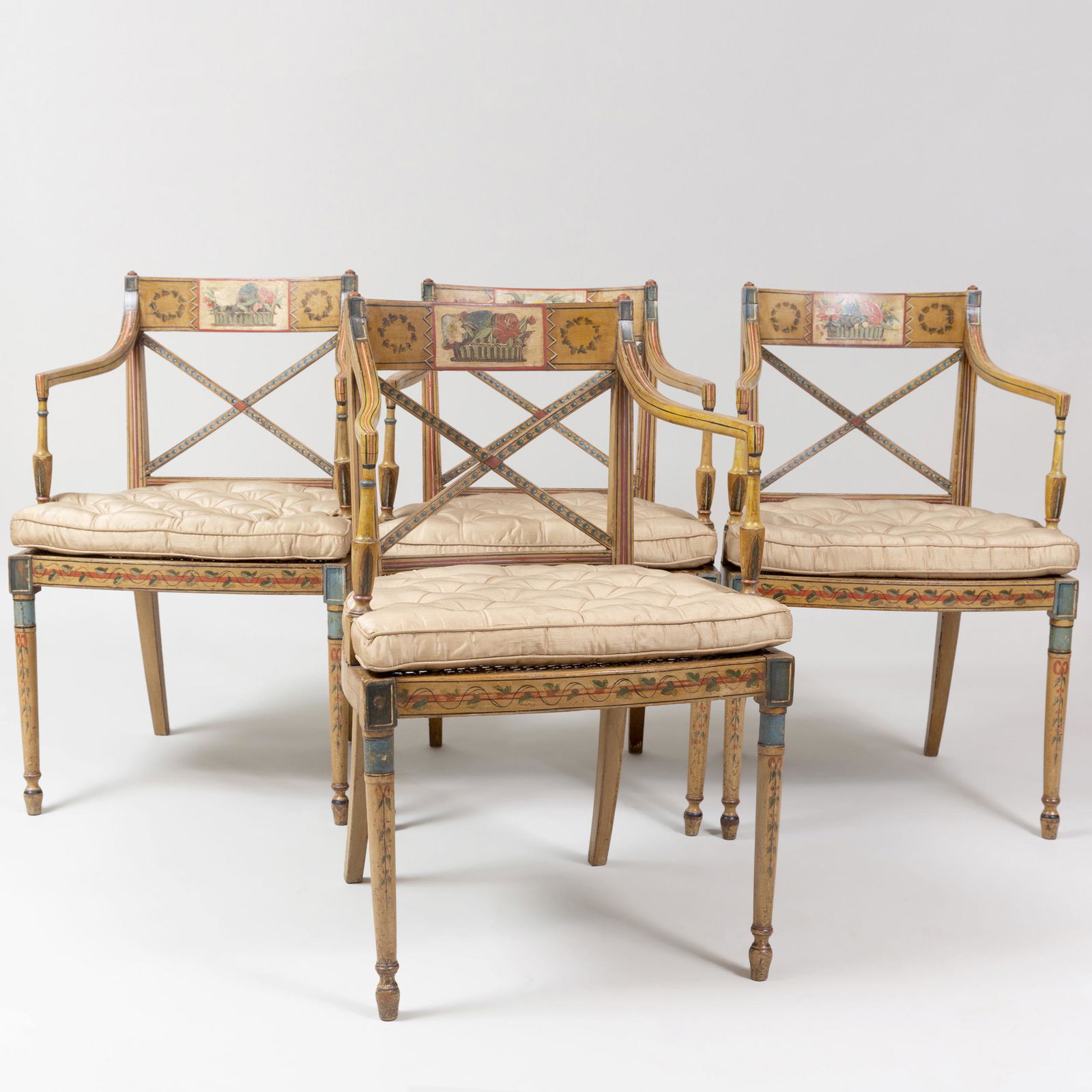 Set of Four George III Painted and Caned Armchairs: Set of Four George III Painted and Caned Armchairs Each fitted with a squab cushion. 33 1/2 x 21 1/2 x 19 3/4 in.