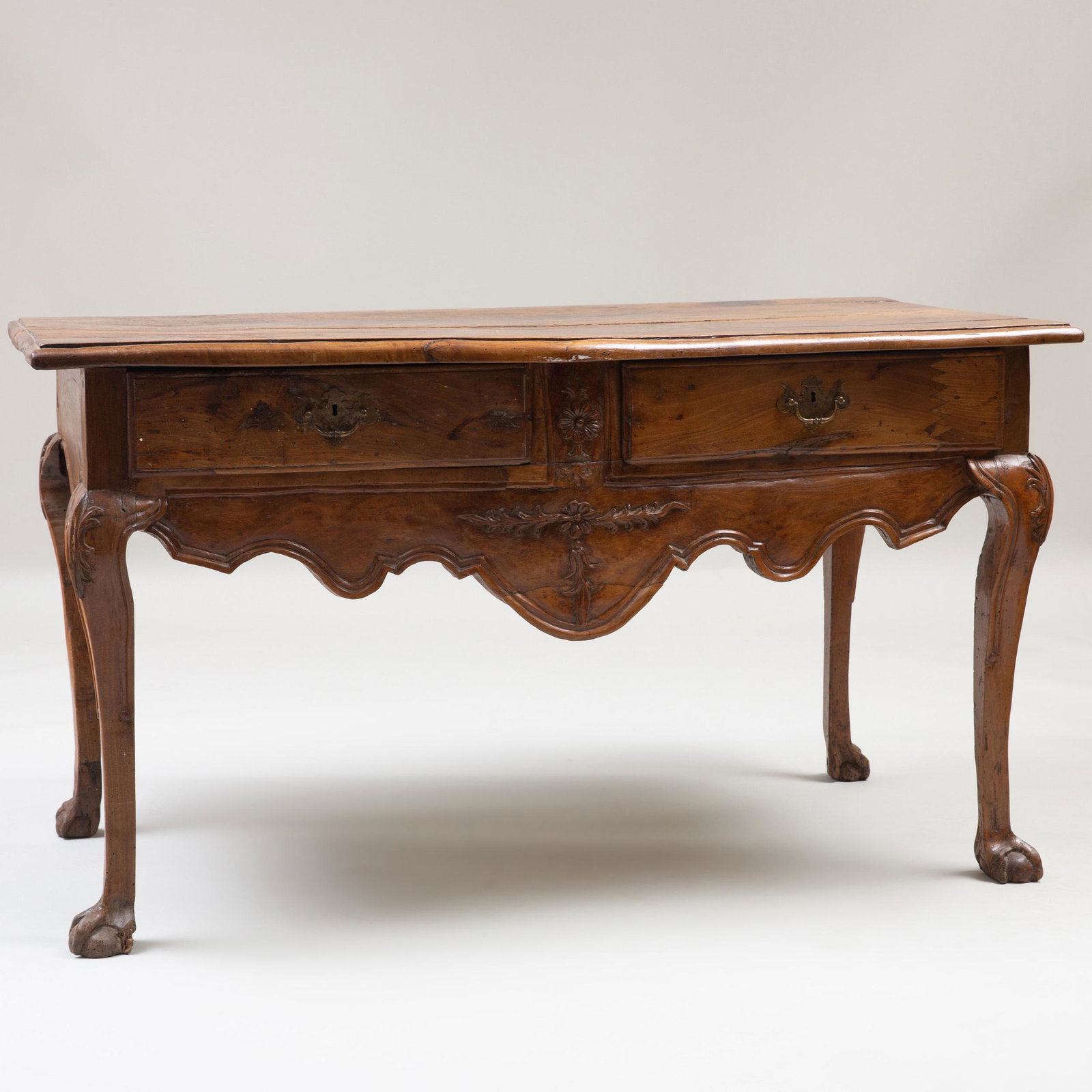 Portuguese Provincial Walnut Console Table: Portuguese Provincial Walnut Console Table Fitted with two drawers. 32 x 4 ft. 10 in. x 31 in.