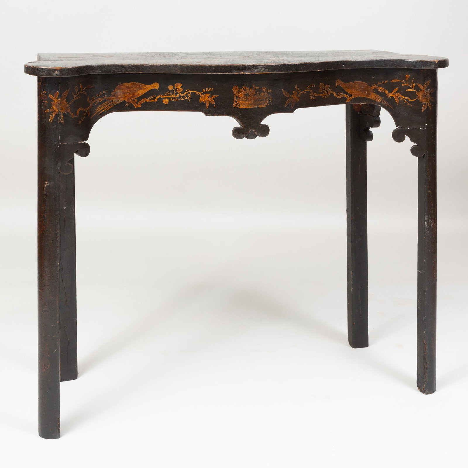 Late George III Black Lacquer and Parcel-Gilt Console: Late George III Black Lacquer and Parcel-Gilt Console Table 35 x 41 3/4 x 17 in. Sibyl Colefax and John Fowler, London.