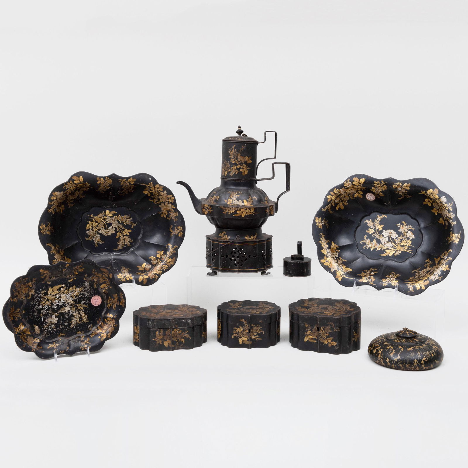 Group of Nine English Black Tôle Table Articles: Group of Nine English Black Tôle Table Articles Comprising: A coffee pot Three tea caddies A pierced jar Two basins A tray A burner Together with an Indian circular box and cover The basins 13