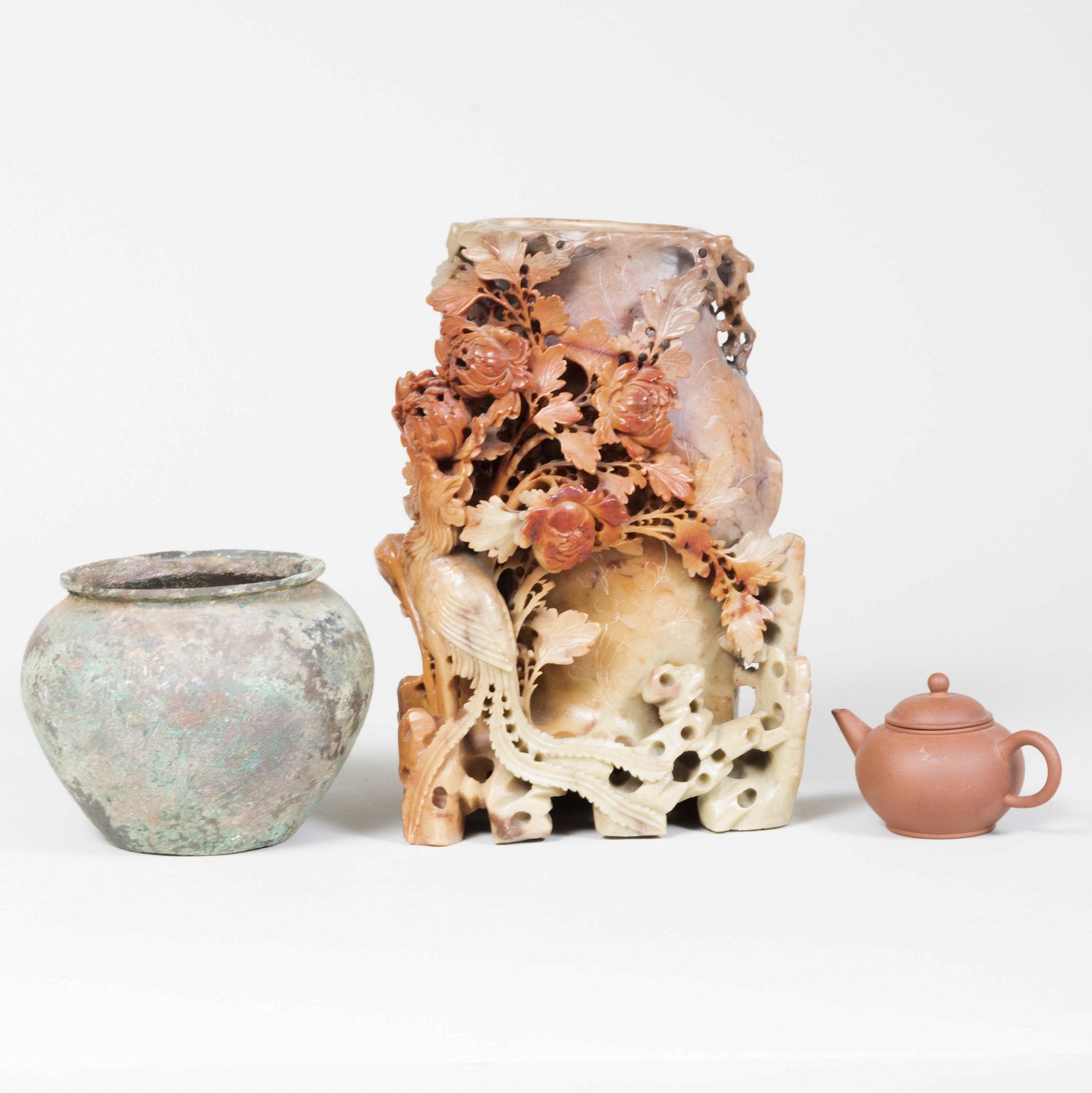 Chinese Soapstone Carved Vase, a Yixing Teapot, and a: Chinese Soapstone Carved Vase, a Yixing Teapot, and a Bronze Vase The vase 9 3/4 in. high. Property from The Herbert F. Johnson Museum of Art, Cornell University, Sold to Support New Acquisitions of A