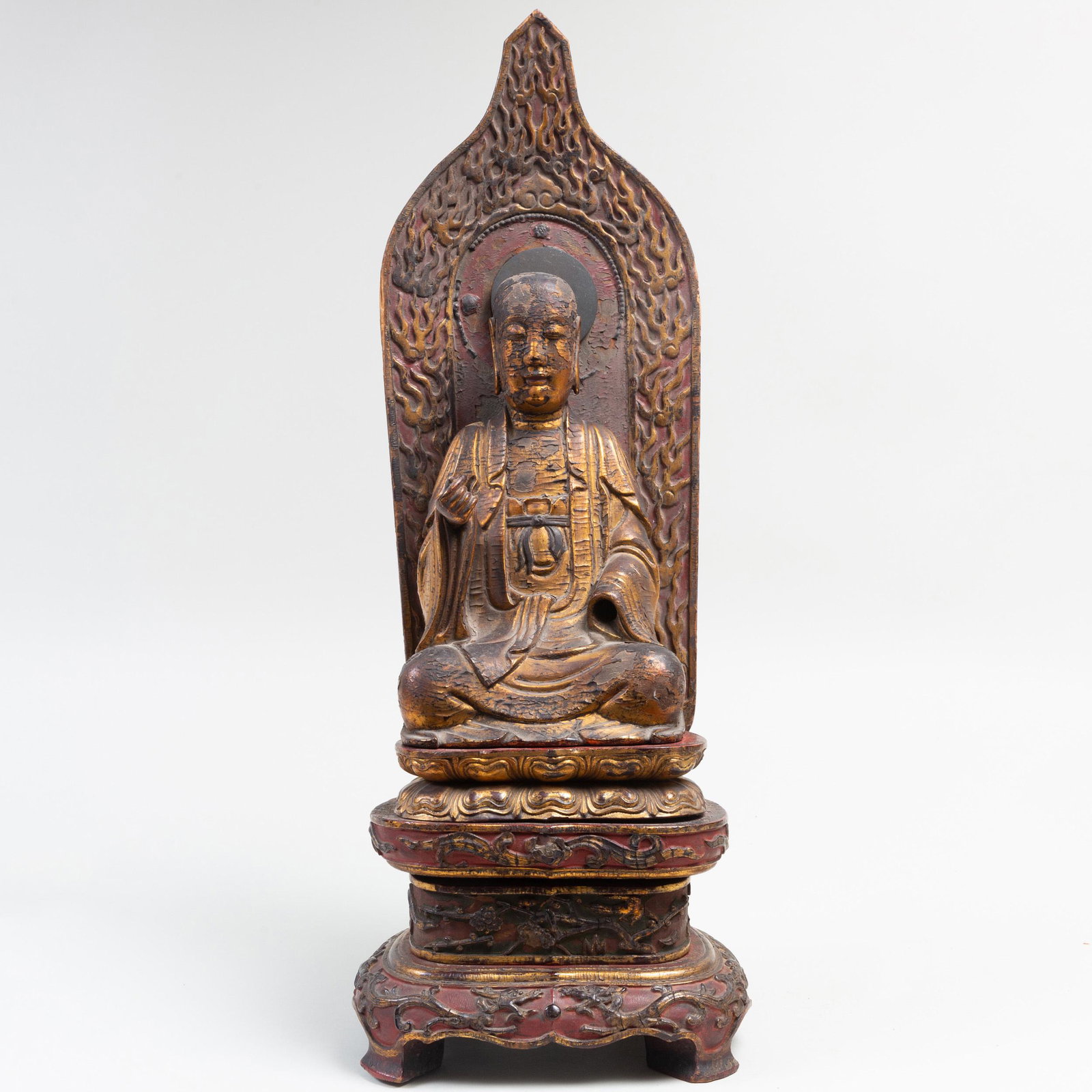 Japanese Gilt-Lacquered Wood figure of a Lohan on Stand: Japanese Gilt-Lacquered Wood figure of a Lohan on Stand Probably Meiji Period, late 19th Century. The figure 12 1/4 in. high; 26 in. high (overall). Property from a Distinguished Gentleman, New York 
