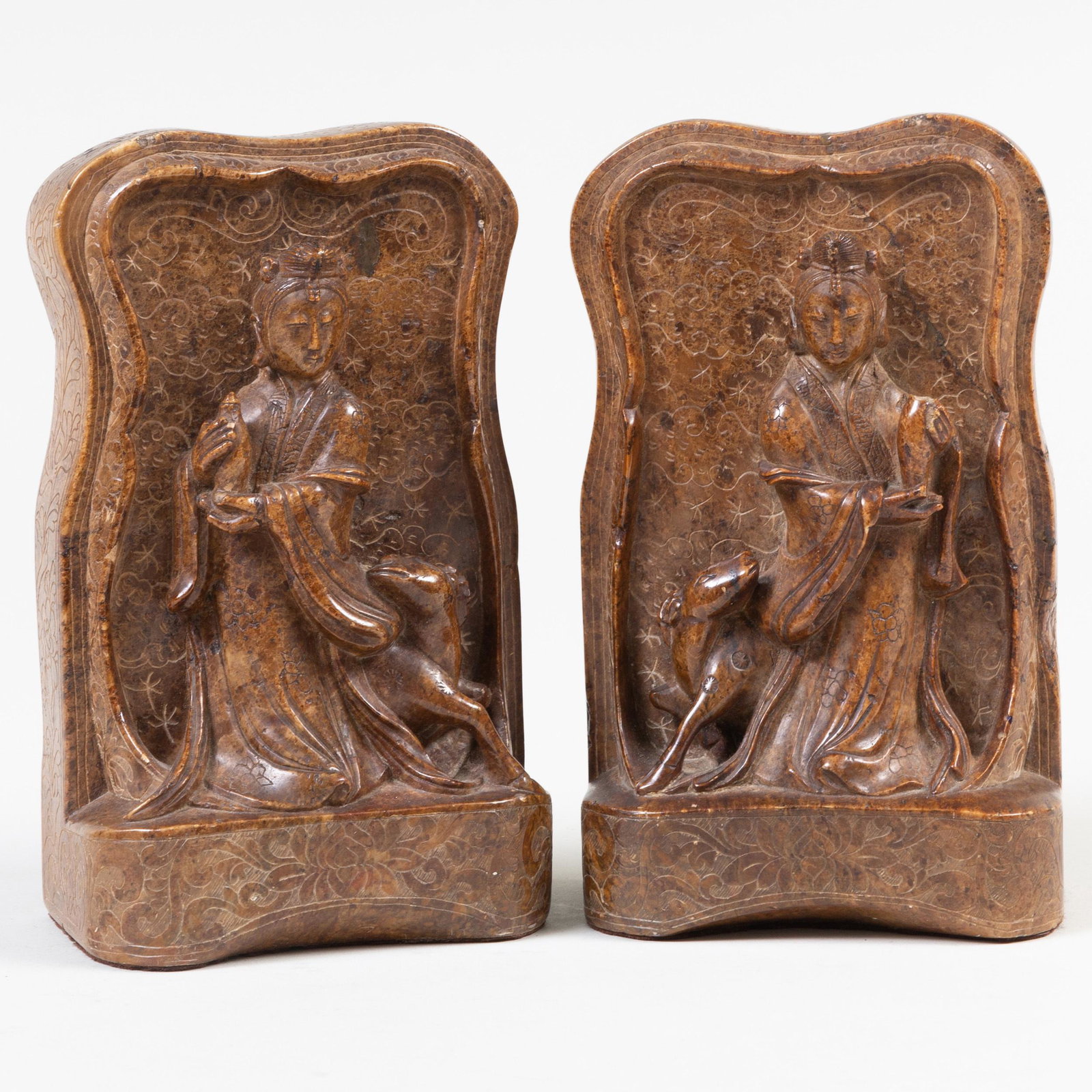 Pair of Chinese Carved Soapstone Book Ends Carved with: Pair of Chinese Carved Soapstone Book Ends Carved with Guanyin 7 in. high.