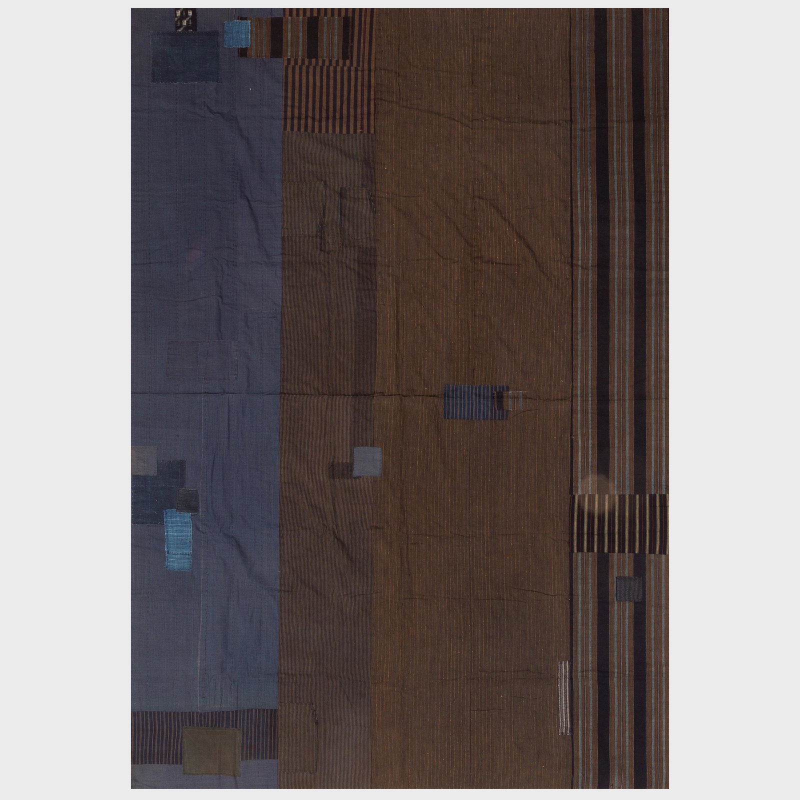 Japanese Sri Indigo Patch Cotton Textile and a Hardwood: Japanese Sri Indigo Patch Cotton Textile and a Hardwood Stool The textile 10 ft. 8 in. x 8 ft., 8 1/4 x 14 x 6 in. Sri Partners LLC.