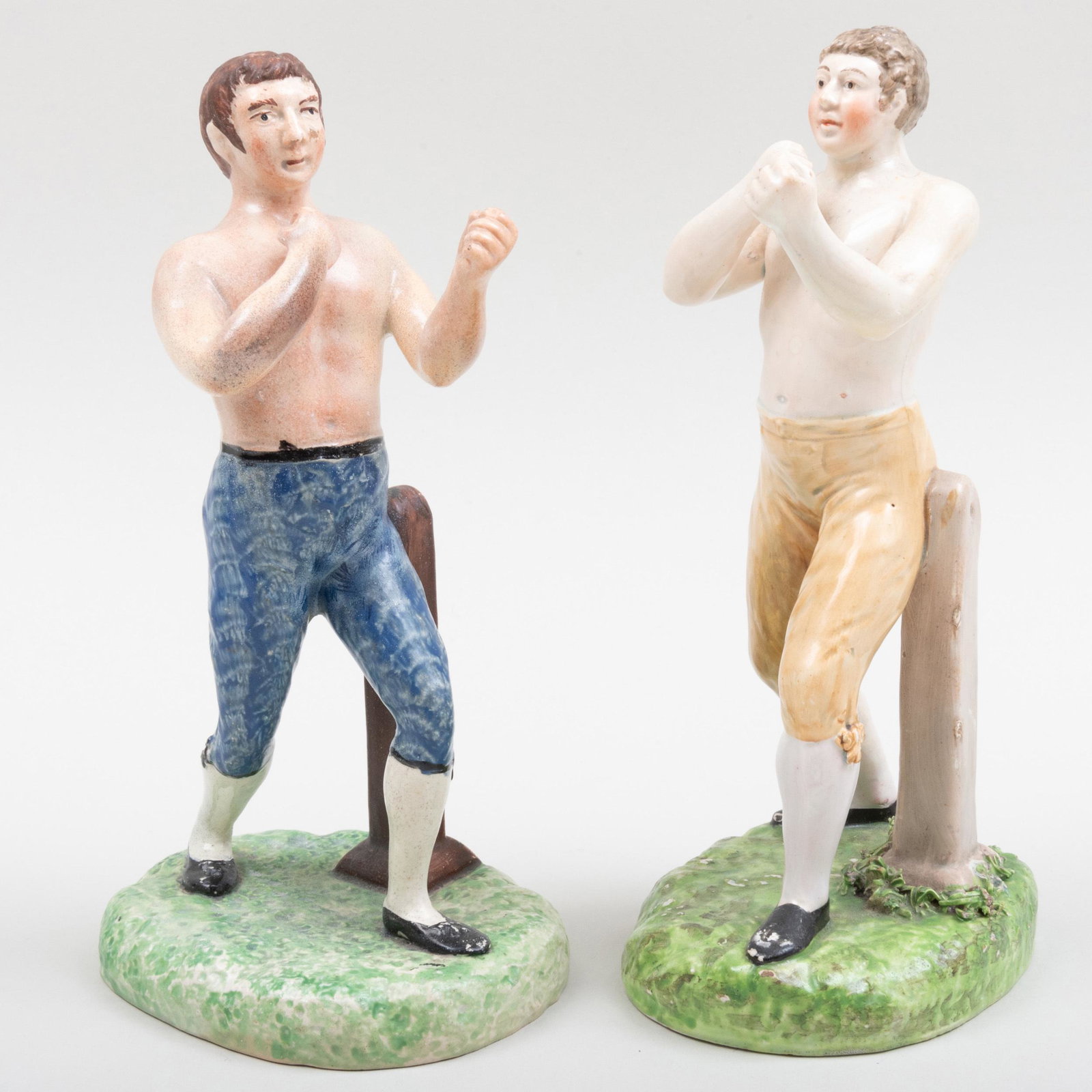 Two Staffordshire Pearlware Figures of Tom Cribb: Two Staffordshire Pearlware Figures of Tom Cribb The larger 9 in. high. Property from a Distinguished New York City Collector