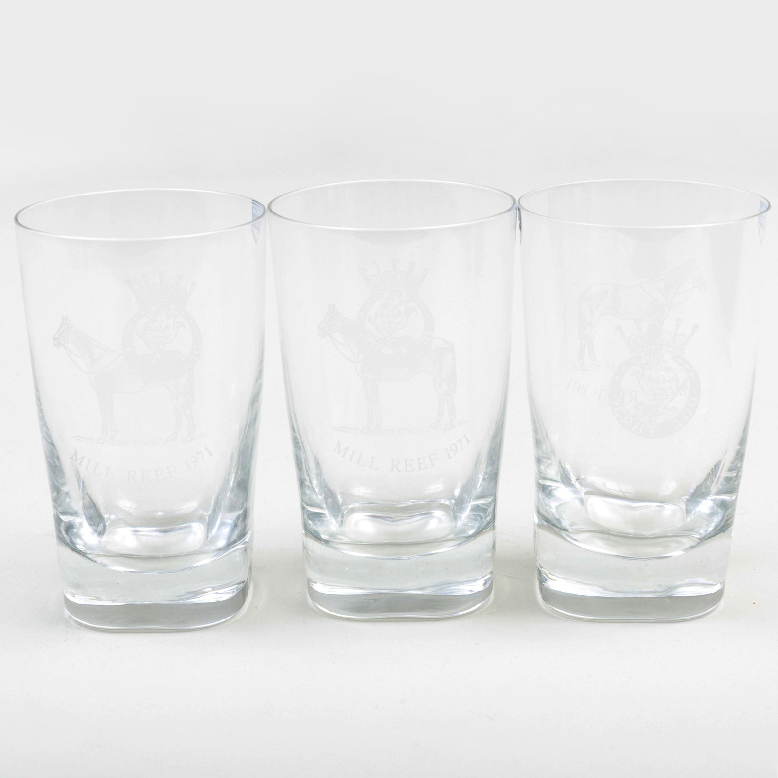 Set of Twelve Orrefors Glass Tumblers Commemorating the: Set of Twelve Orrefors Glass Tumblers Commemorating the 1971 Epsom Derby Etched with winning horse 'Mill Reef'. 5 1/4 in. high. Note: Bred at Rokeby stables in Virginia and trained in England, Mill Re
