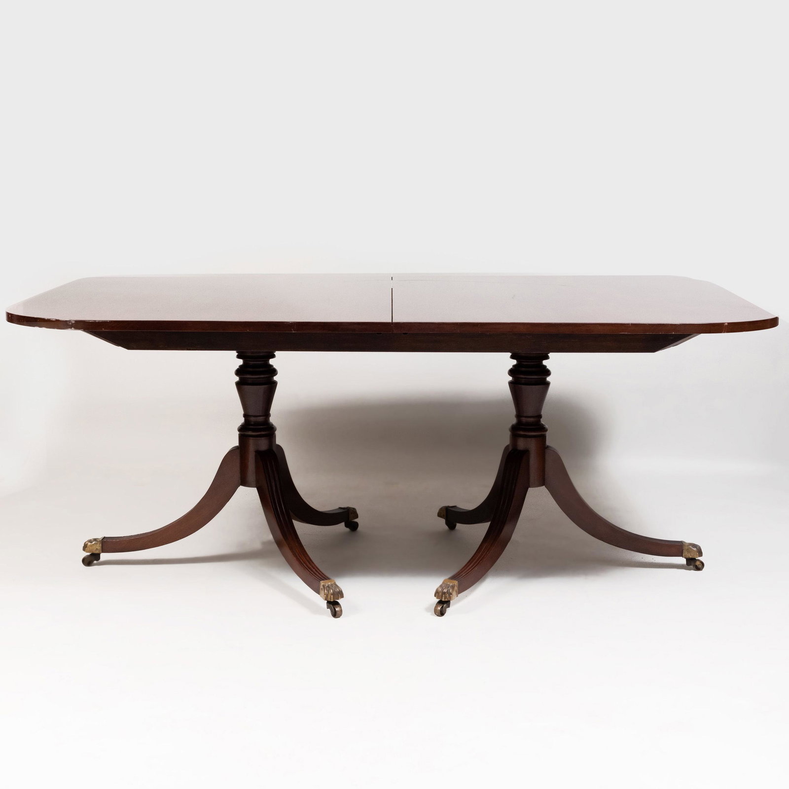 George III Style Mahogany Double Pedestal Dining Table: George III Style Mahogany Double Pedestal Dining Table 29 3/4 x 5 ft. 11 1/2 (without leaves) x 48 in. Three additional leaves, width: 18 1/2 in each.