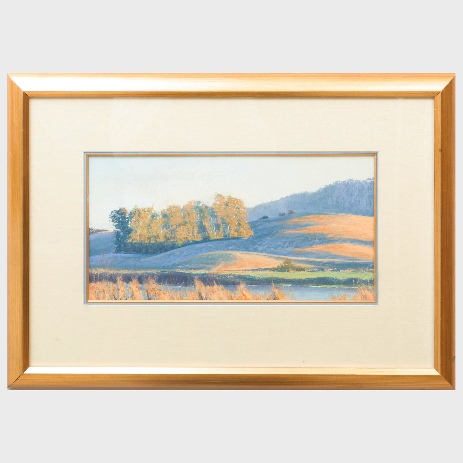 Clark Mitchell: Across the River: Clark Mitchell: Across the River Pastel on paper, 1992, signed 'Clark G. Mitchell' and dated lower left, with label from John Pence Gallery, San Francisco, CA. 9 1/2 x 18 in. (sheet), 20 x 28 1/2 in. 