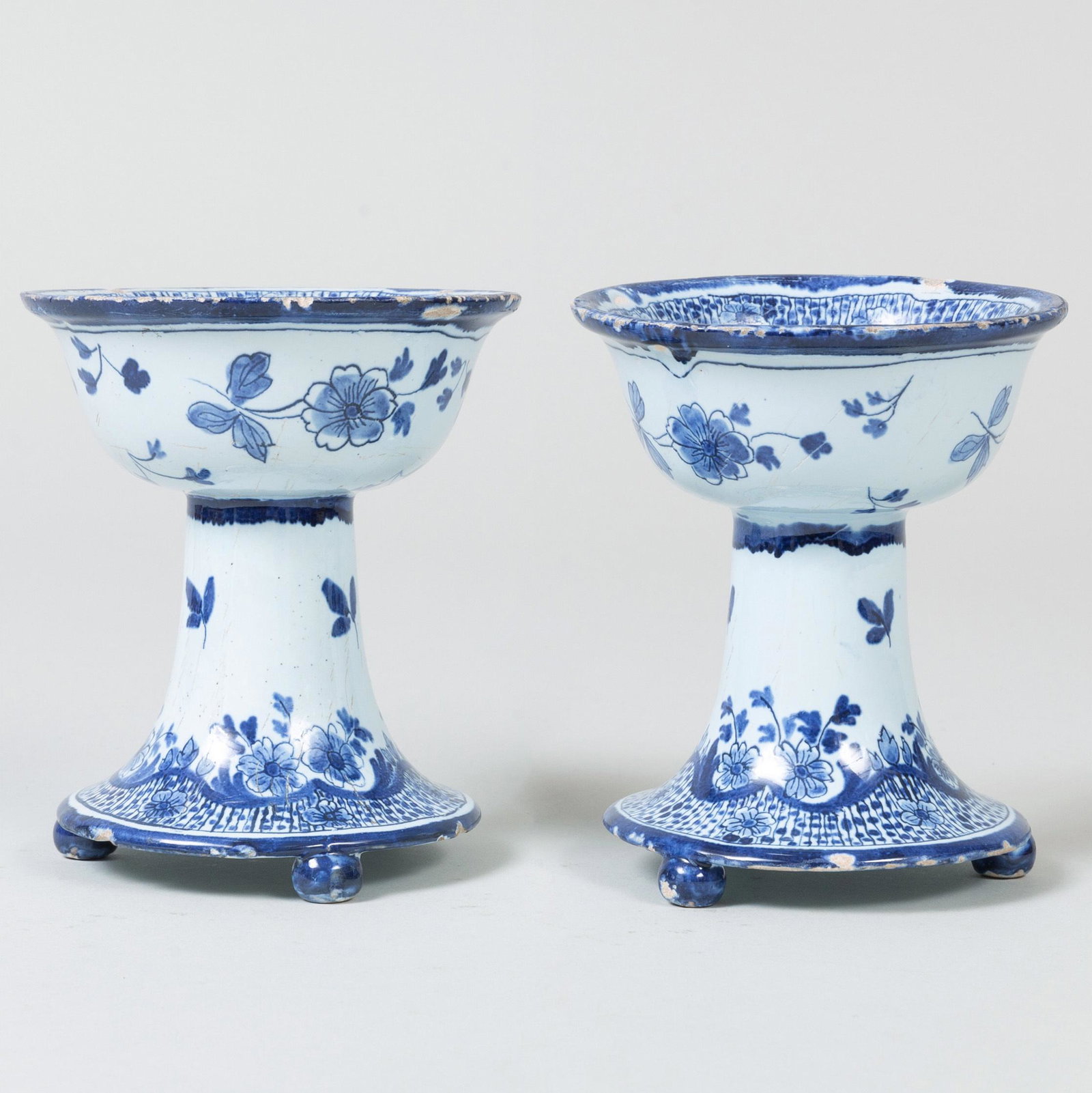 Pair of Dutch Blue and White Delft Stem Cups: Pair of Dutch Blue and White Delft Stem Cups Blue intertwined 'AR' mark. 5 x 4 in. diam.