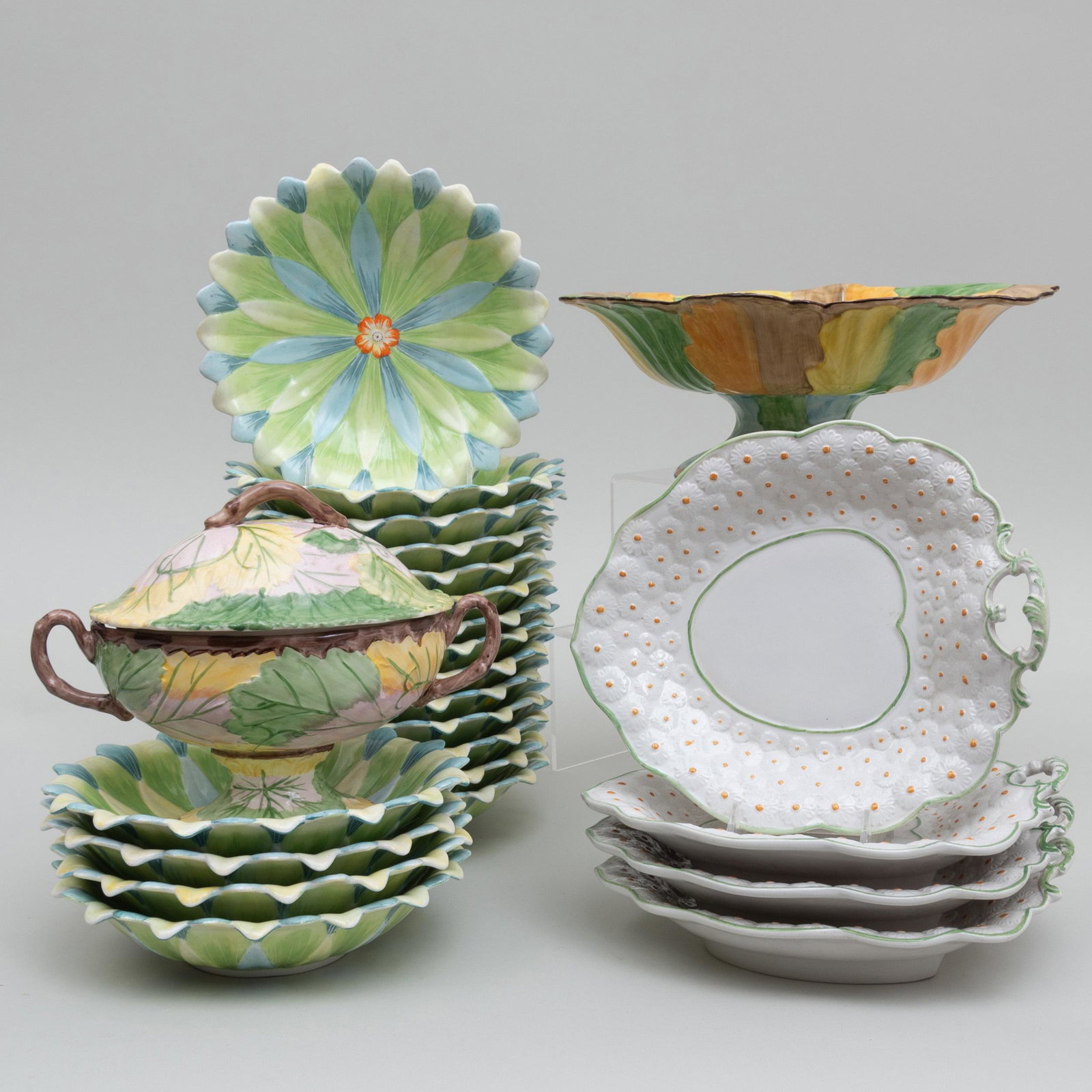 Assembled Mottahedeh Porcelain Floriform Tablewares: Assembled Mottahedeh Porcelain Floriform Tablewares Printed marks. Comprising: A compote A sauce tureen and cover A set of four shaped dishes A set of eighteen bowls The compote 12 in. wide, (24 pcs).