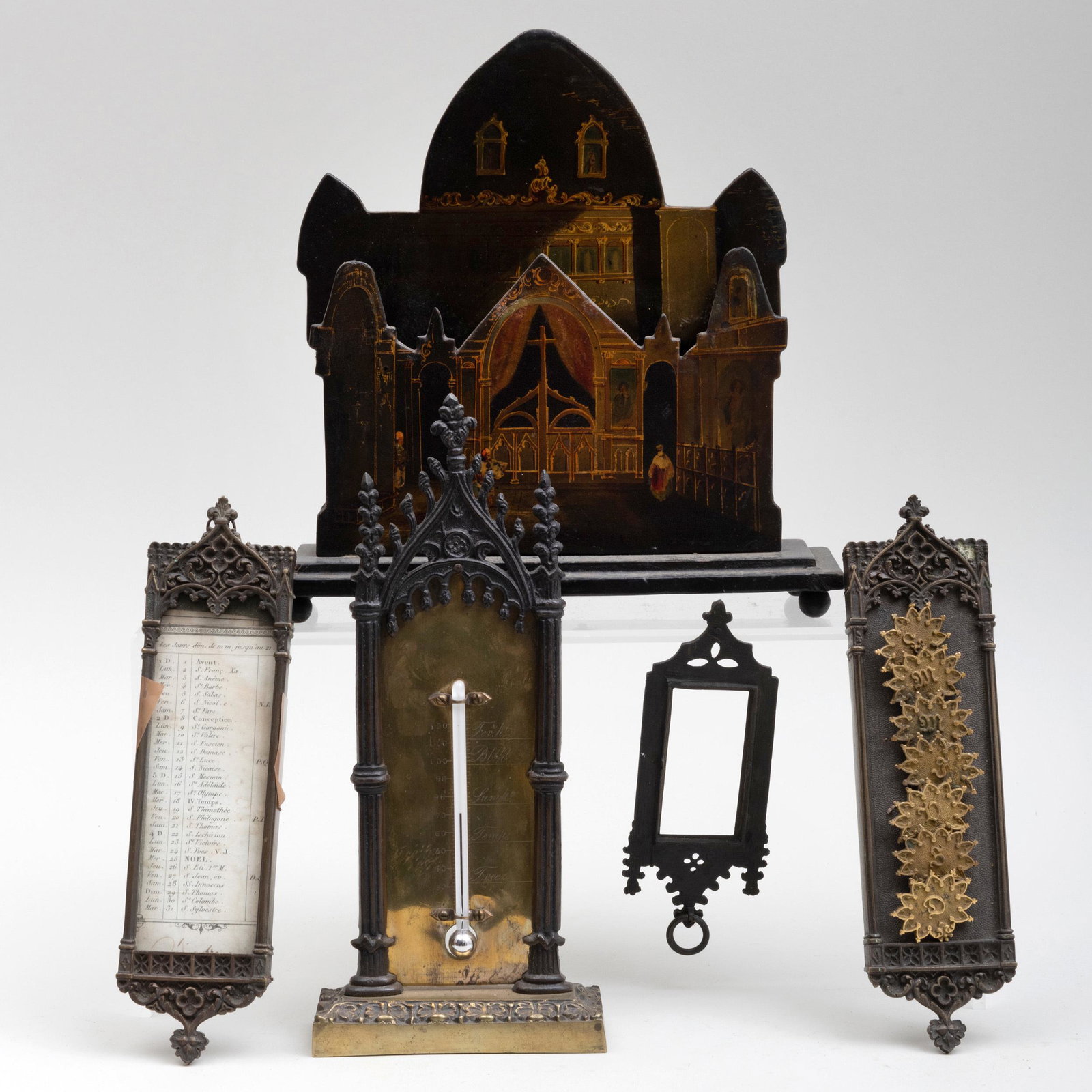 Gothic Style Desk Articles: Gothic Style Desk Articles Comprising: A papier mache letter holder A thermometer A calendar A weekly letter organizer A frame The largest 9 x 9 x 3 in., (5 pcs).
