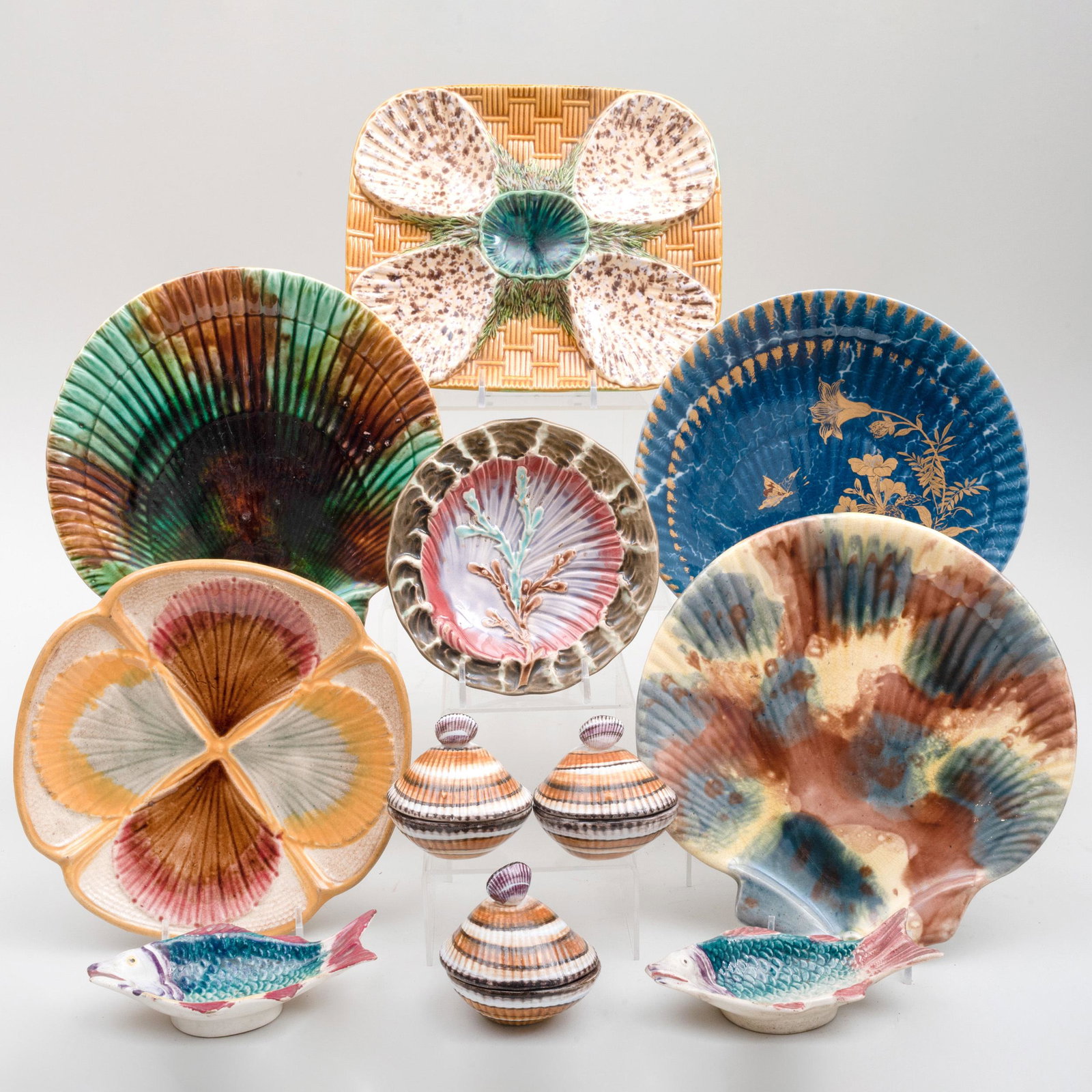 Group of Majolica Shell Decorated Tablewares: Group of Majolica Shell Decorated Tablewares Comprising: A Mintons rectangular shell and basketweave dish, impressed marks A Wedgwood seaweed and shell plate, impressed mark Three scallop shell plates