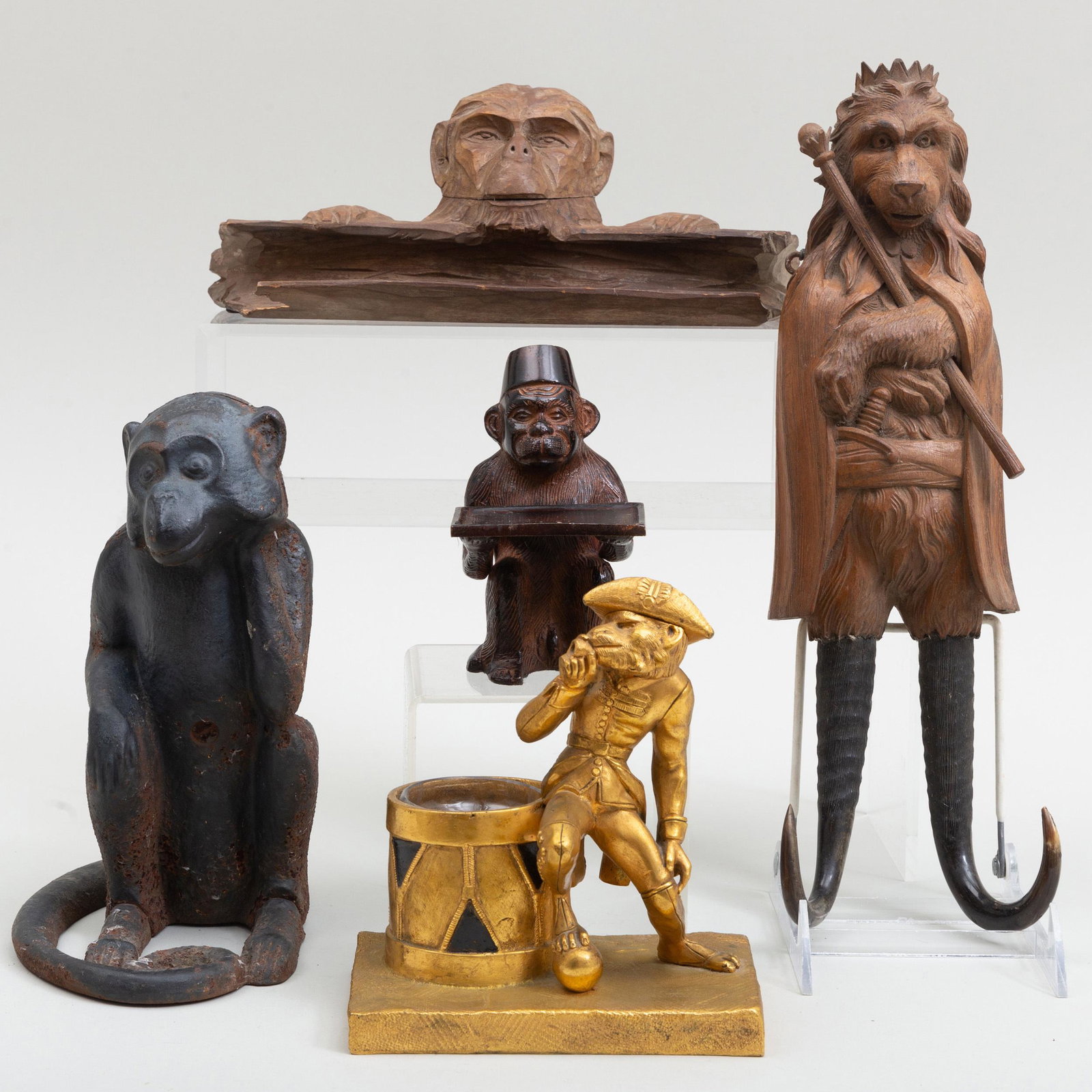 'Barrel of Monkeys' Collection of Themed Ephemera: 'Barrel of Monkeys' Collection of Themed Ephemera Comprising: A carved wood inkstand A painted metal doorstop A gilt-metal inkwell A patinated metal card stand A carved wood and antler hat rack The la