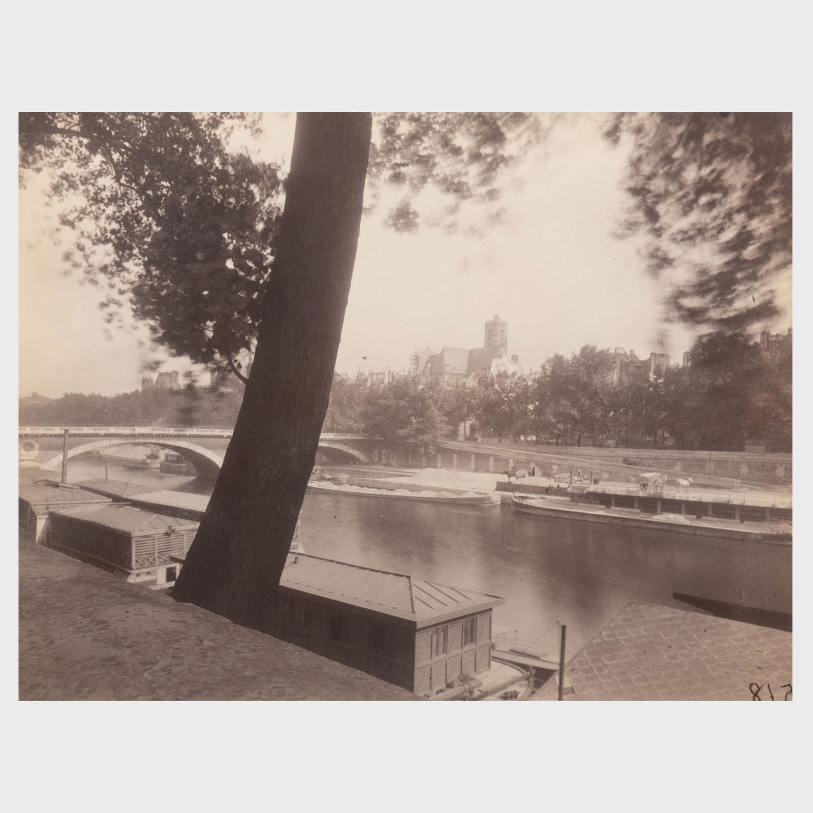 Eugène Atget (1857-1927): Un coin de L'Ile Saint Louis: Eugène Atget (1857-1927): Un coin de L'Ile Saint Louis Arrowroot print, with the artist's inkstamp, titled and inscribed '17bis' on the reverse, inscribed 'MoMA dupe 2002', with label from David Tuni