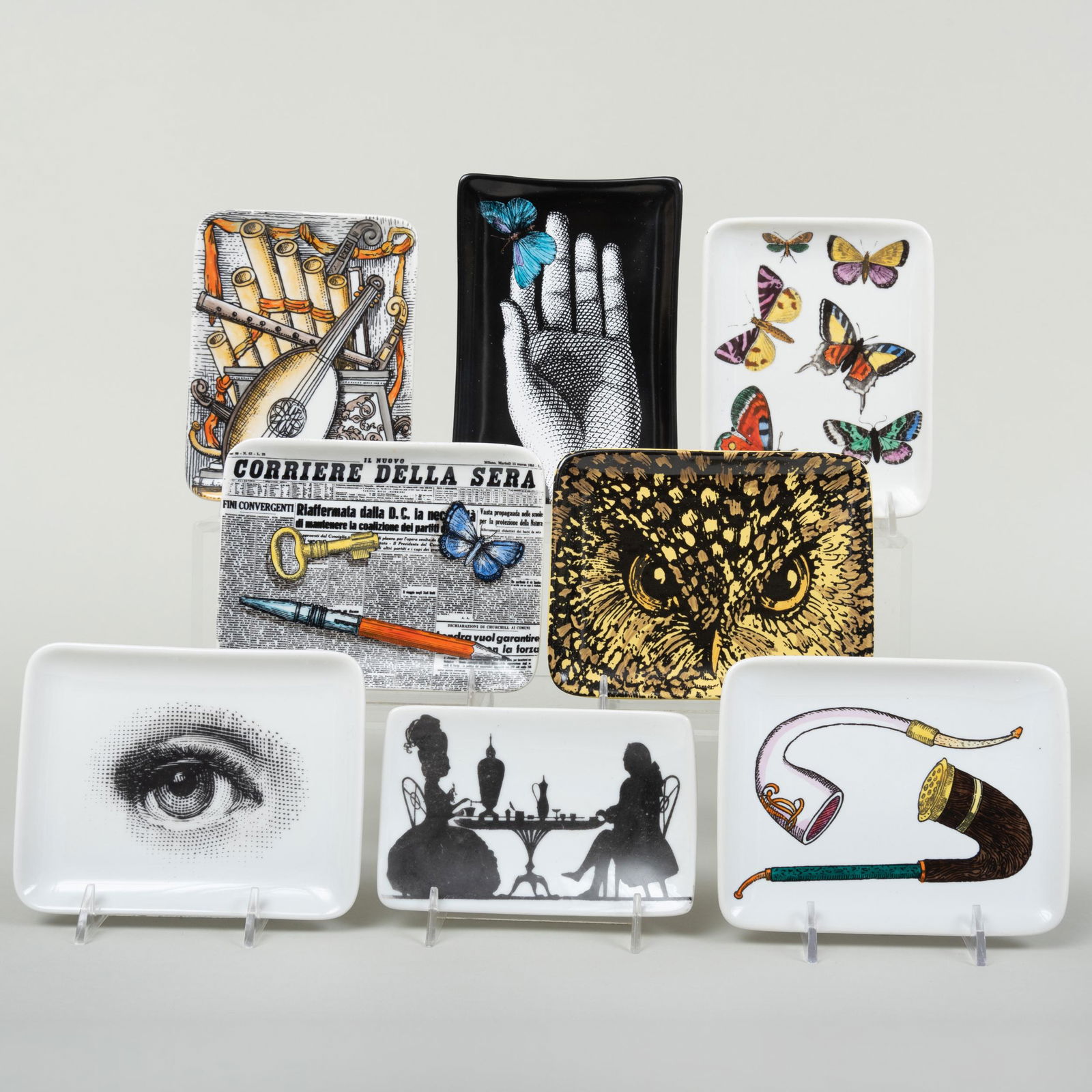 Set of Eight Fornasetti Transfer Printed Porcelain: Set of Eight Fornasetti Transfer Printed Porcelain Rectangular Dishes Various black printed marks. Comprising: A white ground dish with pipes A white ground dish with eye A white ground dish with hand