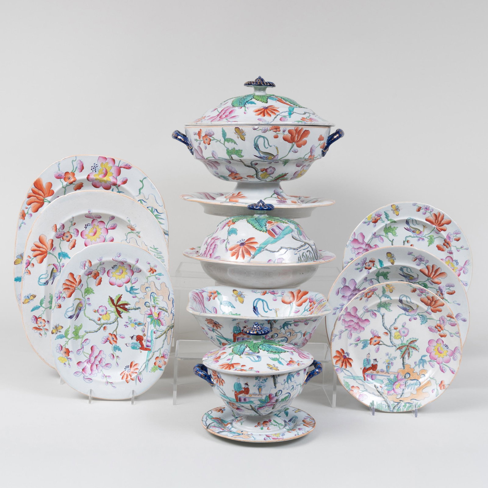 English Ironstone Chinoiserie Part Service: English Ironstone Chinoiserie Part Service Blue printed mark. Comprising: A soup tureen, cover and stand A circular vegetable dish and cover Three platters in graduated sizes Two sauce tureens, covers