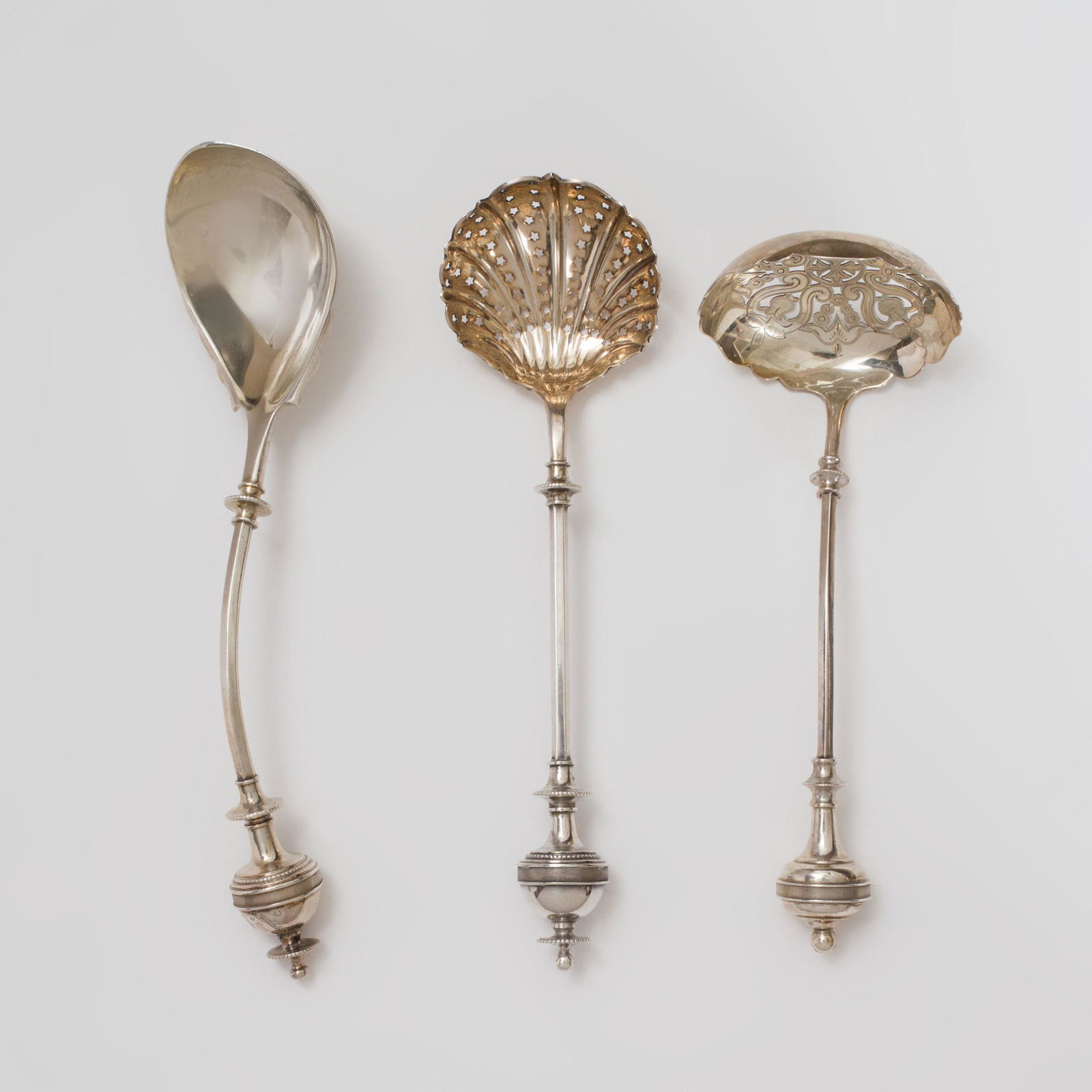 Group of Three George Sharp Design Silver Serving: Group of Three George Sharp Design Silver Serving Pieces Each marked 'Sterling'. Comprising: A spoon with pointed bowl and scalloped edge, marked 'Sterling Patented' A ladle with pierced scrollwork bo