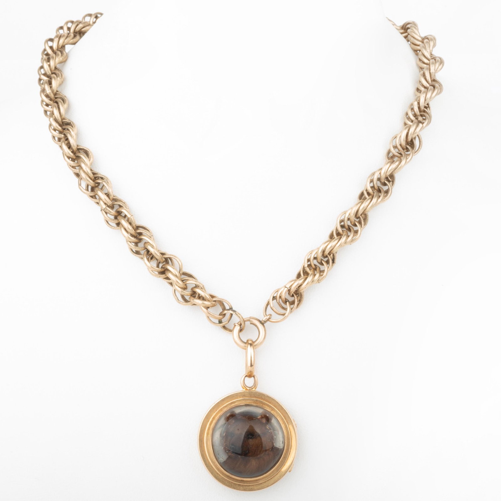 Gold Filled Rope Chain, with 14k Gold Locket Pendant: Gold Filled Rope Chain, with 14k Gold Locket Pendant Both unmarked. Chain 15 in., 25.3 dwts., and pendant 1 1/8 in., 14.5 dwts.