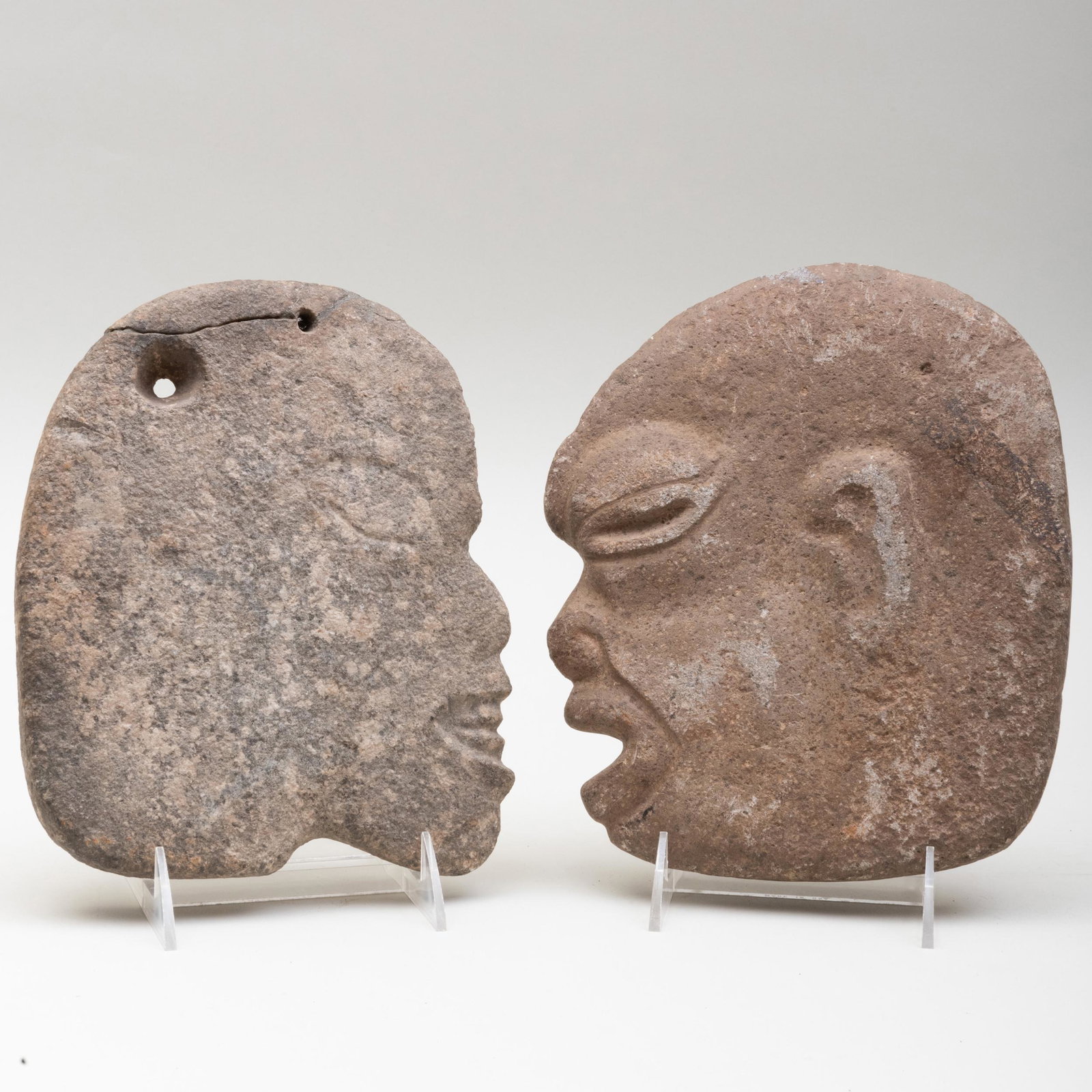 Two Mayan Stone Relief Hachas: Two Mayan Stone Relief Hachas The larger 9 x 7 1/2 in., the smaller 8 1/4 x 7 in. Property From the Estate of Thomas A. Cox Sold Doyle, NY, October 13, 1998, Lot 89 and 90.