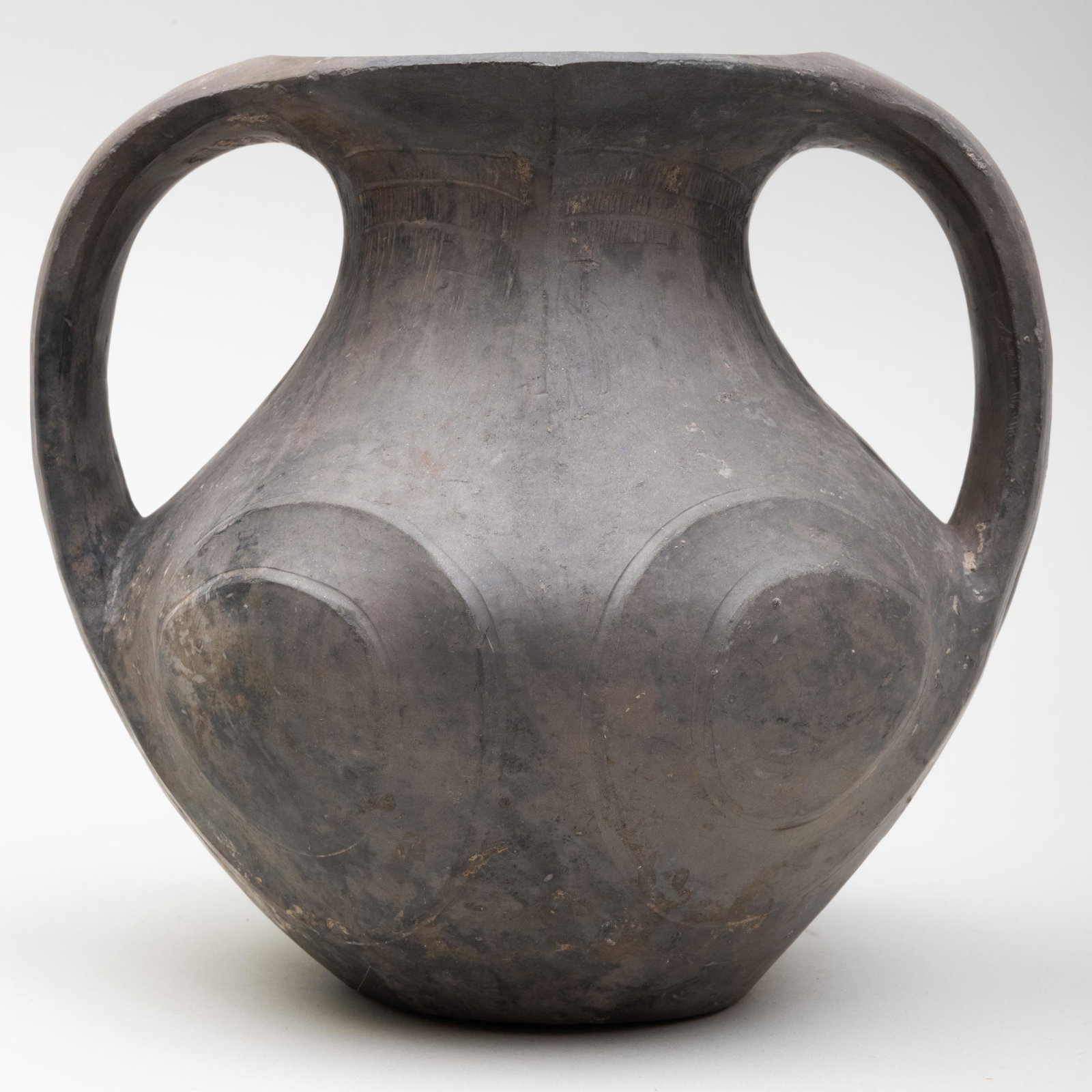 Chinese Grey Pottery Amphora: Chinese Grey Pottery Amphora 6 3/4 in. high. Property from the Collection of Tom Swope, Hudson, NY Sold Stair Galleries, Estate of Seward Kennedy, February 25, 2017, Lot 120.