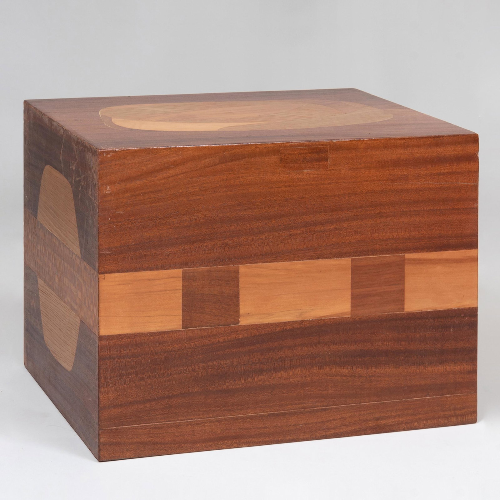 Louis David Designed Cubist Style Mahogany and Cherry: Louis David Designed Cubist Style Mahogany and Cherry Parquetry Pedestal Signed 'David, 1972'. 17 3/4 x 24 x 18 in. Note: Louis David was a painter and immigrant from Hungary and arrived in US in 1956