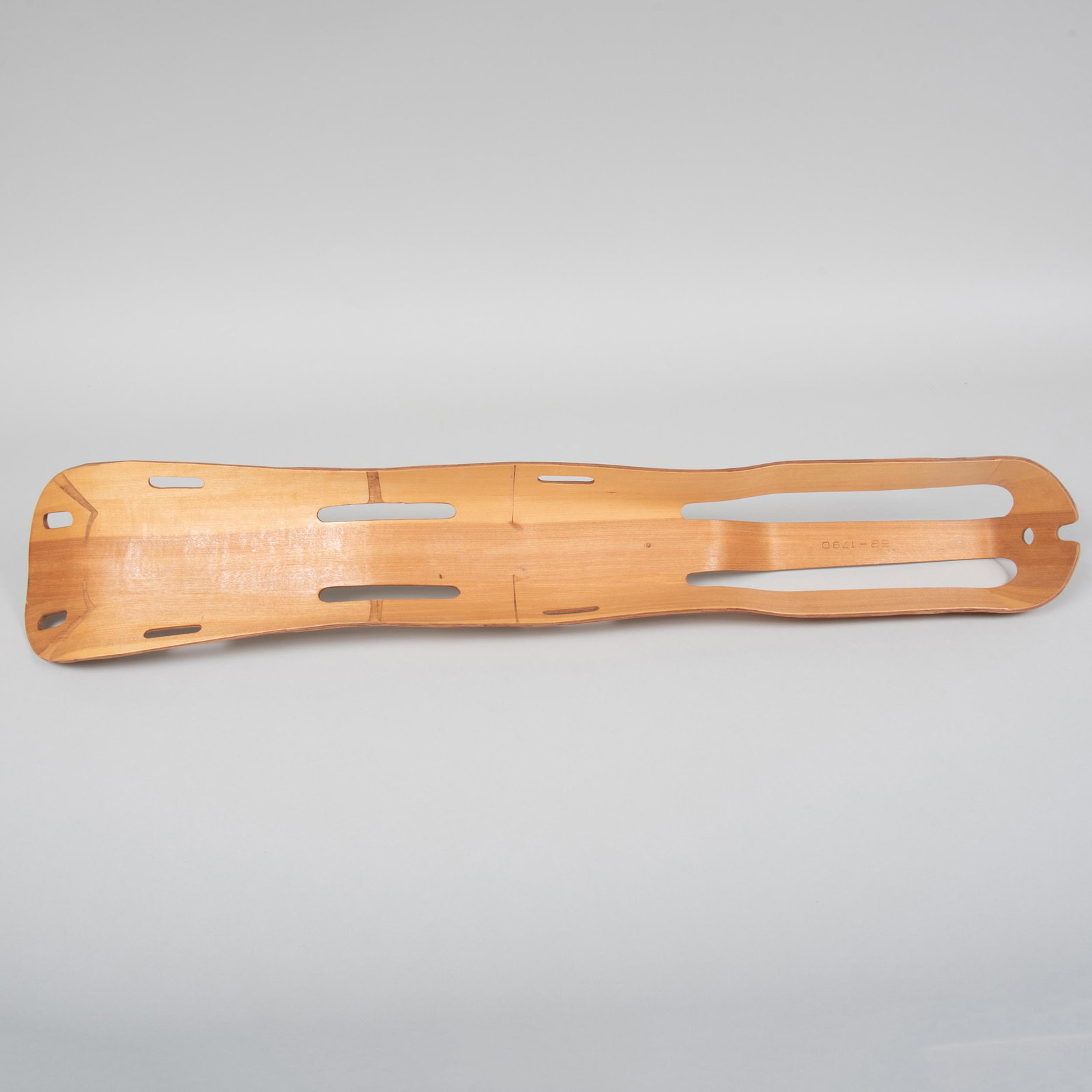 Charles and Ray Eames for Evans Products Molded Plywood: Charles and Ray Eames for Evans Products Molded Plywood Leg Splint, 1943 Stamped #S2-1790 with the original label. 42 1/2 in. long.