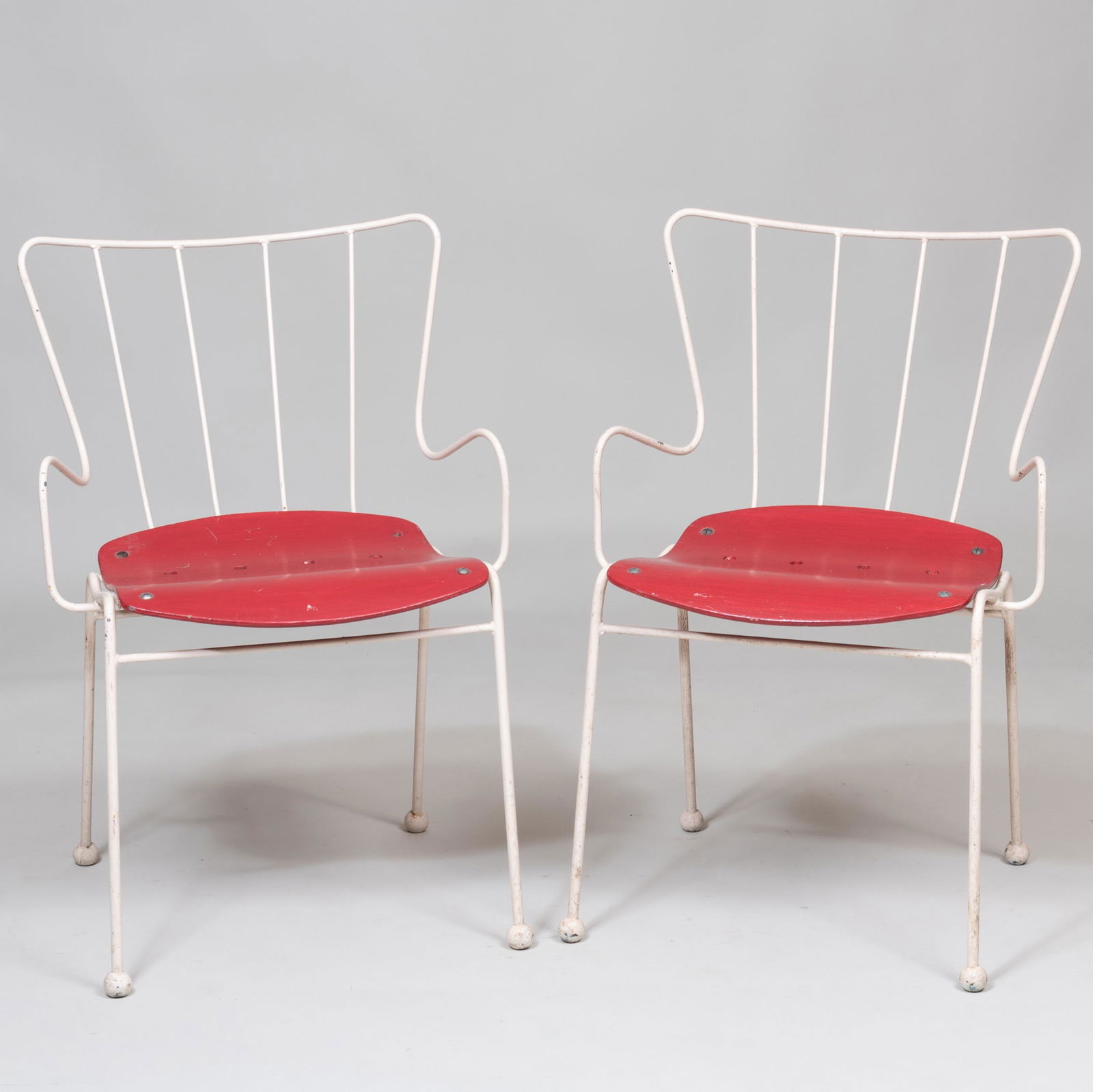 Pair of English Ernest Race Coated Metal and Stained: Pair of English Ernest Race Coated Metal and Stained Wood Armchairs 32 x 21 1/4 x 19 1/2 in. Literature: Philadelphia Museum of Art, Design Since 1945, p. 133; Provenance: Sold Wright Auctions, Chicag