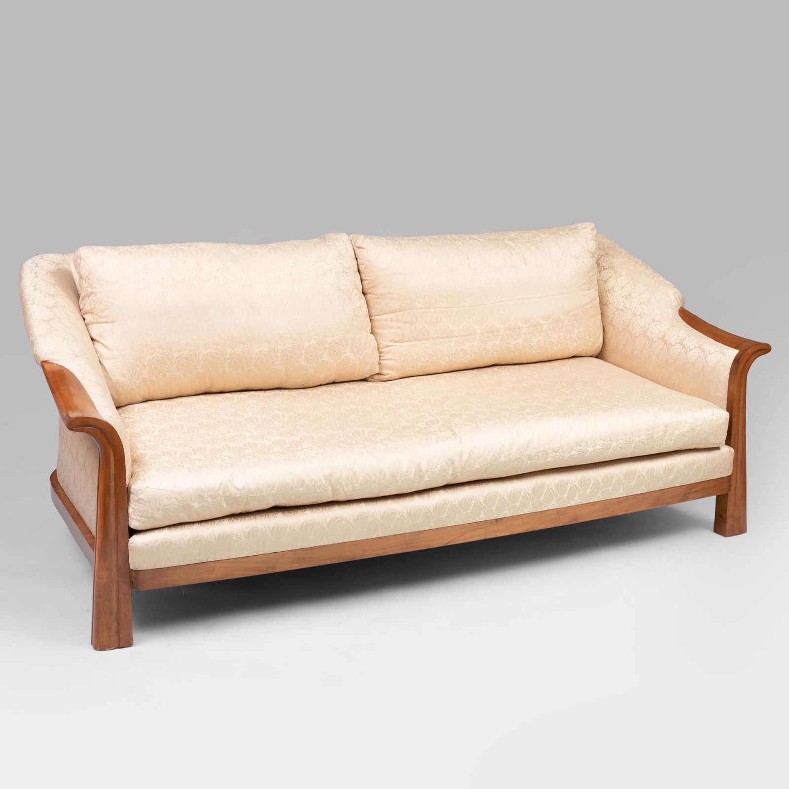 Raoul Parra Pierre Chareau Style Maple Upholstered Sofa: Raoul Parra Pierre Chareau Style Maple Upholstered Sofa Upholstered in a beige rose pattern damask. 32 x 6 ft. 3 in. x 39 1/2 in.