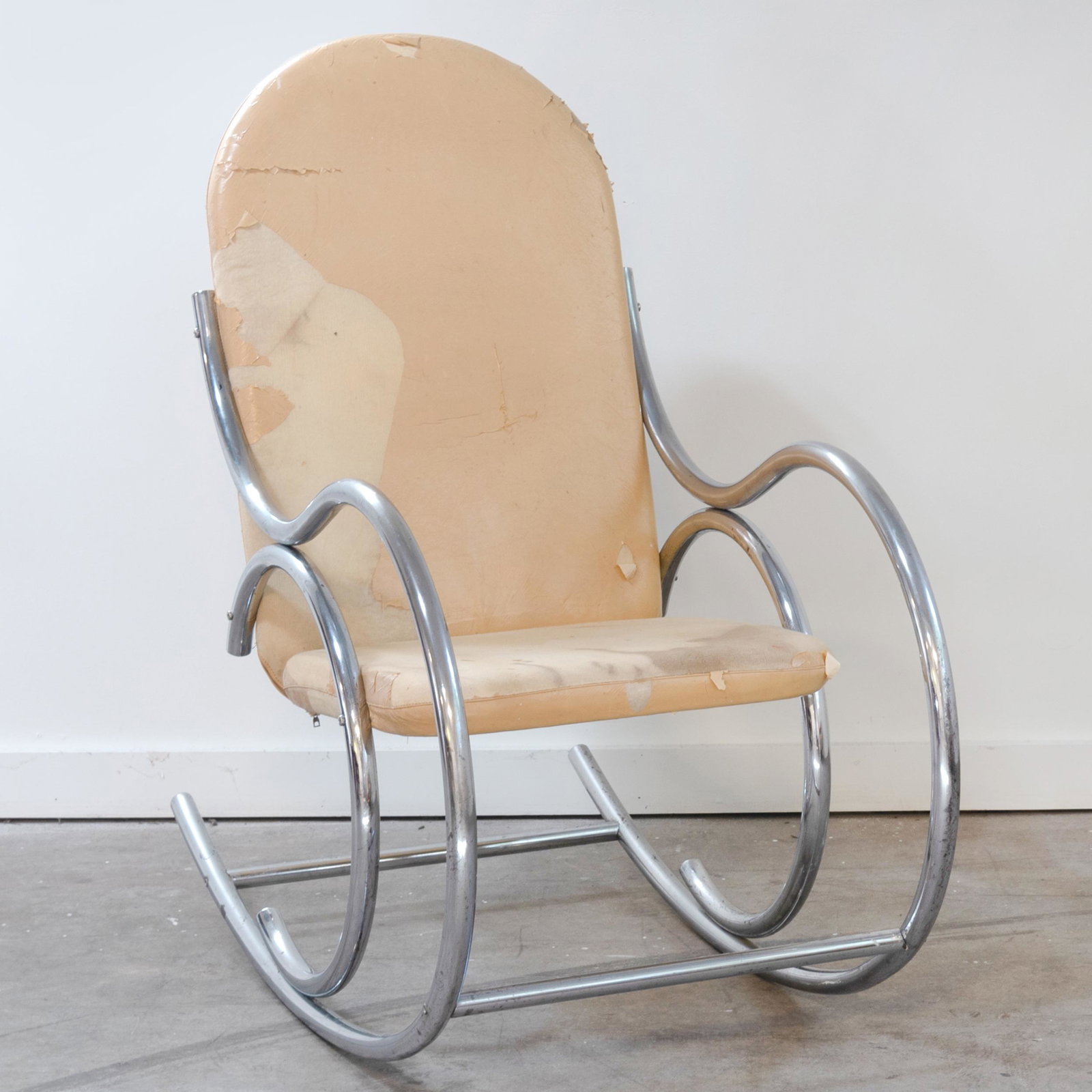 Modern Chrome Upholstered Rocking Chair: Modern Chrome Upholstered Rocking Chair With a label 'Churchill Furniture Rental, Inc.'. 33 x 43 x 24 in.