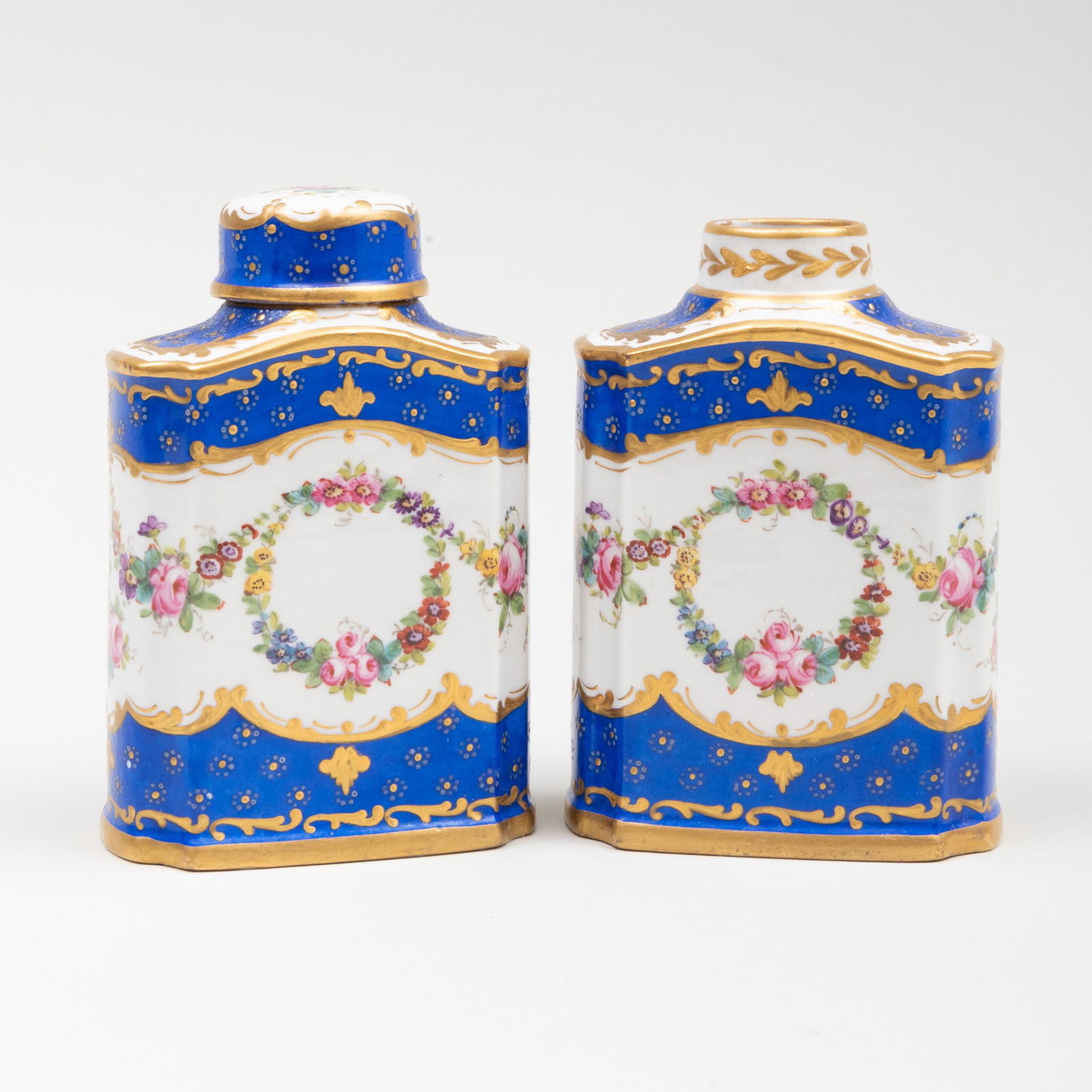 Pair of Paris Porcelain Tea Caddies: Pair of Paris Porcelain Tea Caddies Blue crossed arrow marks. The larger 5 1/2 in. high. Literature: Bramble, Mark. A Tea Caddy Collection, Schiffer Publishing Ltd., PA, 2017, pg. 136 ill. Property