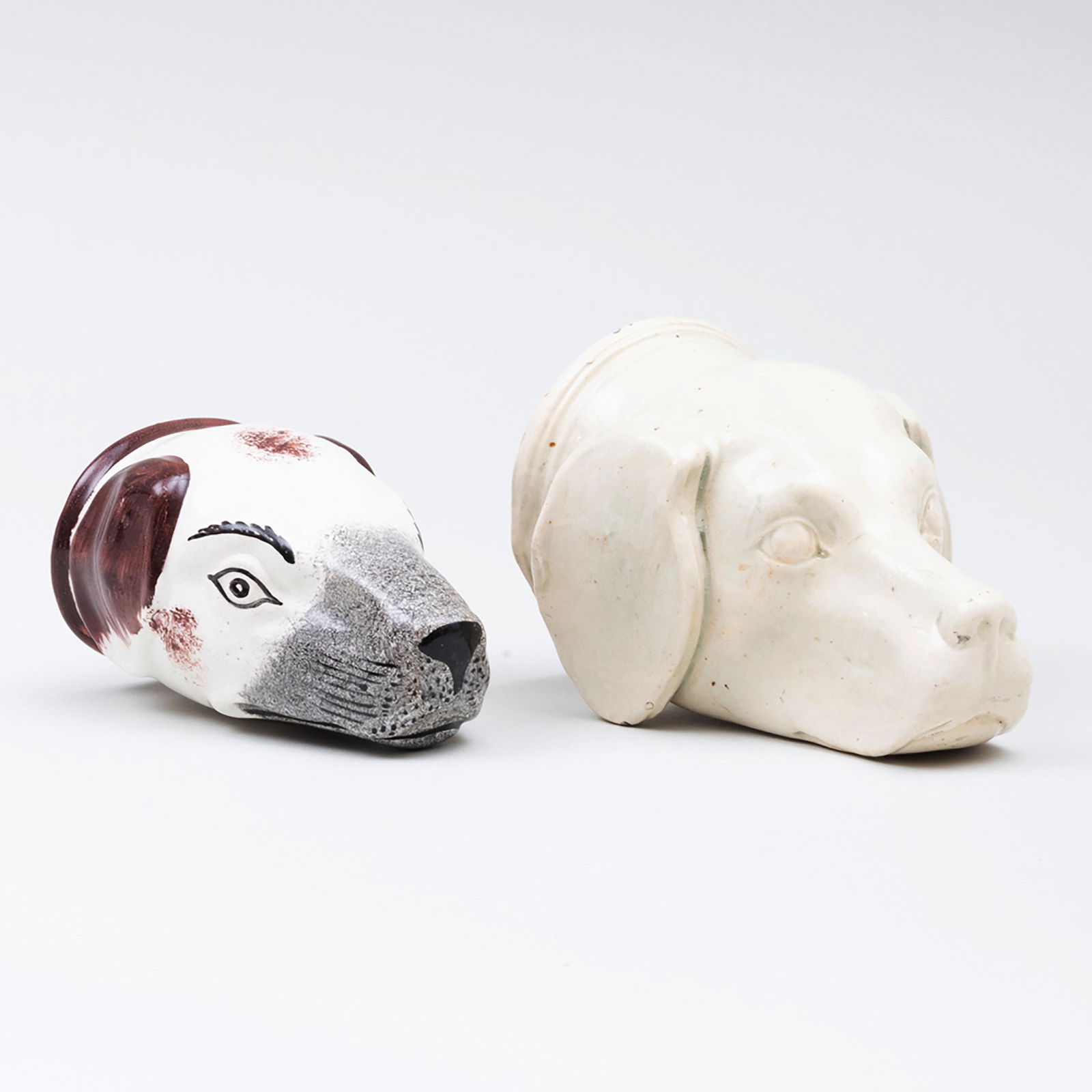 Two Staffordshire Hound Form Stirrup Cups (1 of 8)