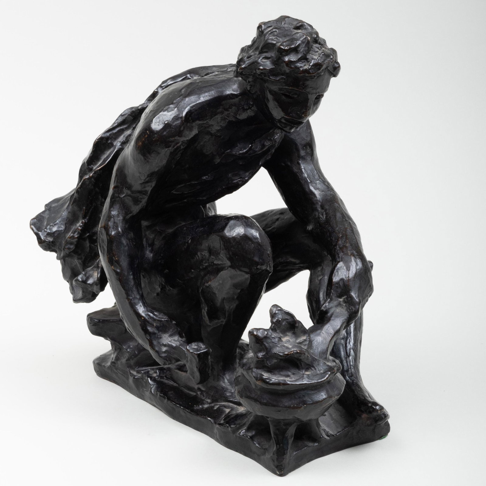 After Pierre-Auguste Renoir (1841-1919): Petit Forgeron: After Pierre-Auguste Renoir (1841-1919): Petit Forgeron Bronze, inscribed 'Renoir' at bottom, on a black slate base. 11 1/2 x 10 x 6 in. (without base). Property from a Distinguished Collection, New Y