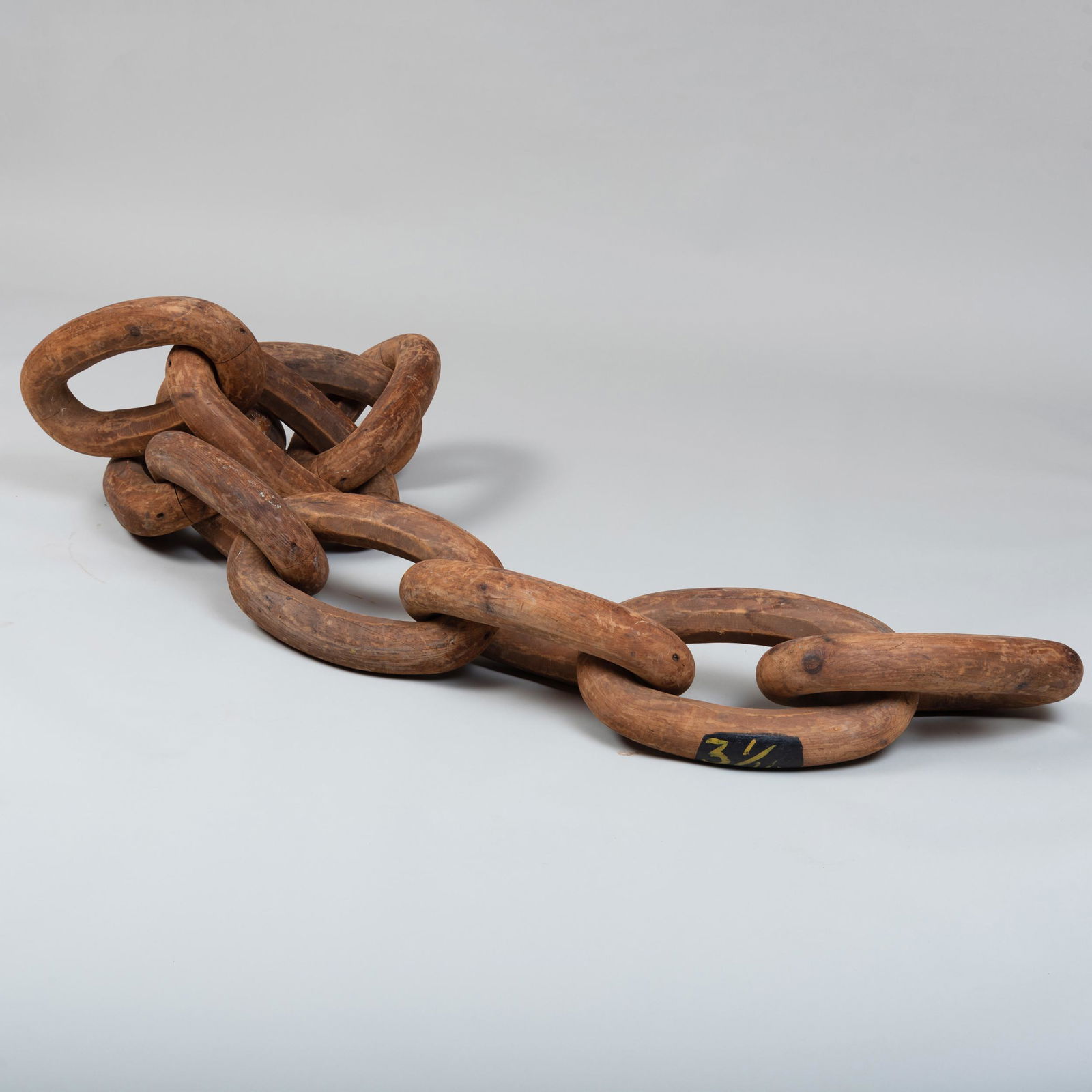 Large Folk Art Carved Wood Model of a Linked Chain: Large Folk Art Carved Wood Model of a Linked Chain Marked in black paint, '3 1/16. 10 ft. long (overall). John Richardson: A Scholar Collects