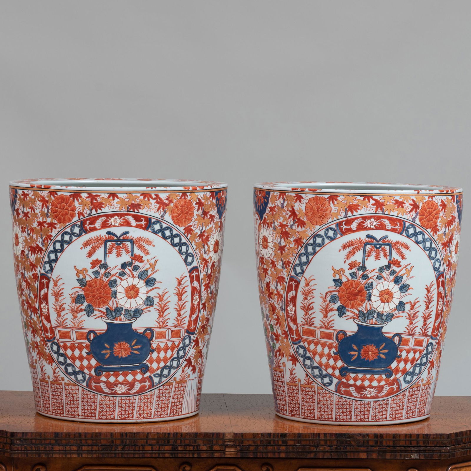 Pair of Japanese Imari Porcelain Jardinières: Pair of Japanese Imari Porcelain Jardinières Iron red character marks. 26 x 16 in. diam. (overall). John Richardson: A Scholar Collects