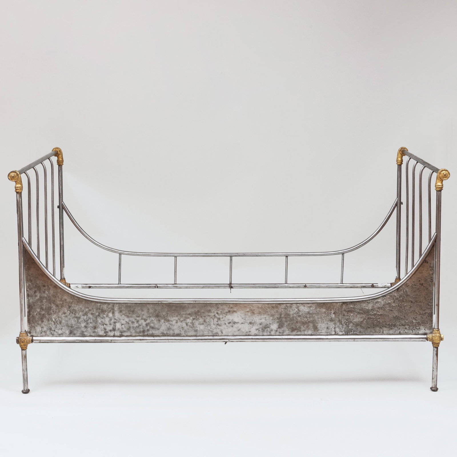 French Gilt-Metal-Mounted Polished Steel Campaign Bed: French Gilt-Metal-Mounted Polished Steel Campaign Bed 41 1/2 x 7 ft. x 46 in. John Richardson: A Scholar Collects
