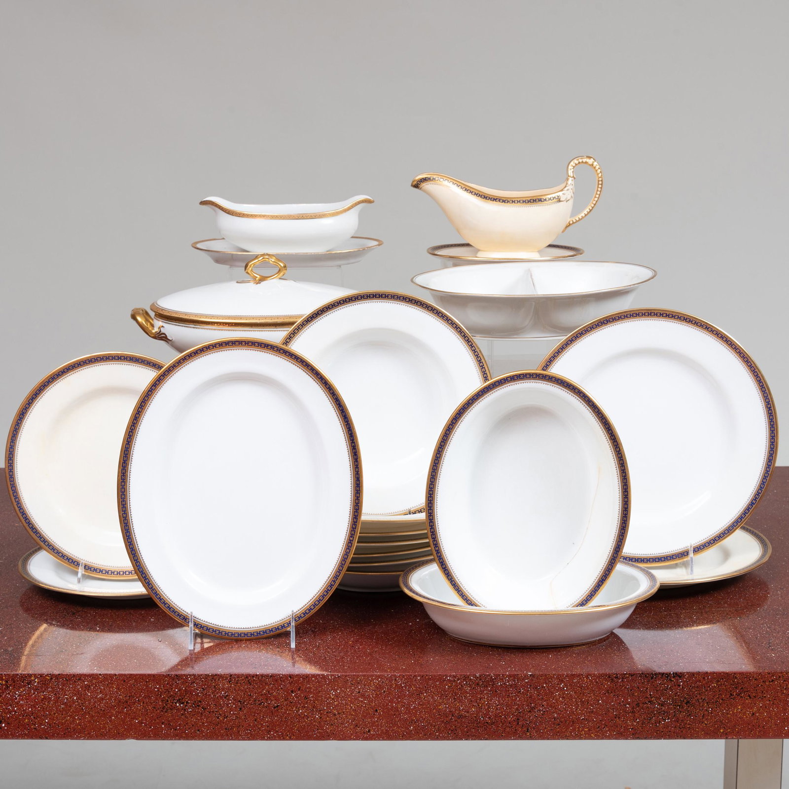 Copeland Spode Porcelain Part Service and Three Limoges: Copeland Spode Porcelain Part Service and Three Limoges Serving Pieces The service comprising: Seven soup bowls Two dinner plates Two luncheon plates Small oval platter Gravy boat and under plate Two 