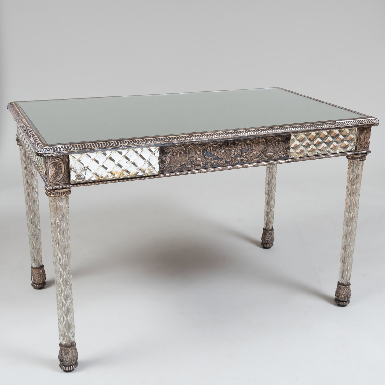 Unusual Edwardian Silver Plate-Mounted Cut Glass and: Unusual Edwardian Silver Plate-Mounted Cut Glass and Mirrored Dressing Table, Possibly Osler Fitted with three retractable drawers on the front and one on the reverse. 28 1/2 x 43 3/4 x 26 3/4 in. Joh