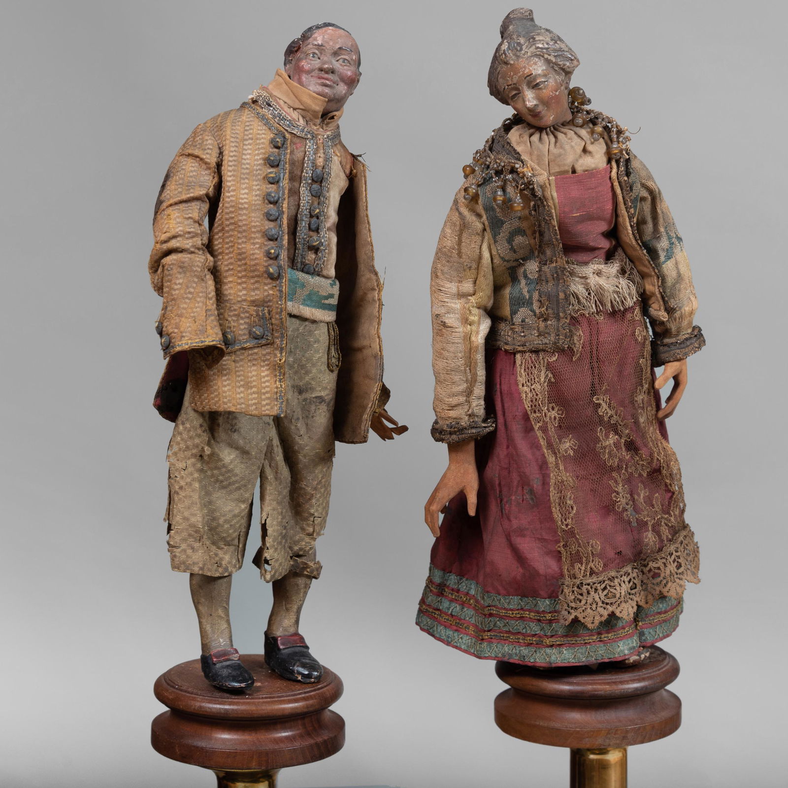 Pair of Italian Painted Wood and Fabric Crèche Figures: Pair of Italian Painted Wood and Fabric Crèche Figures On later stands. 15 in. high (overall). John Richardson: A Scholar Collects