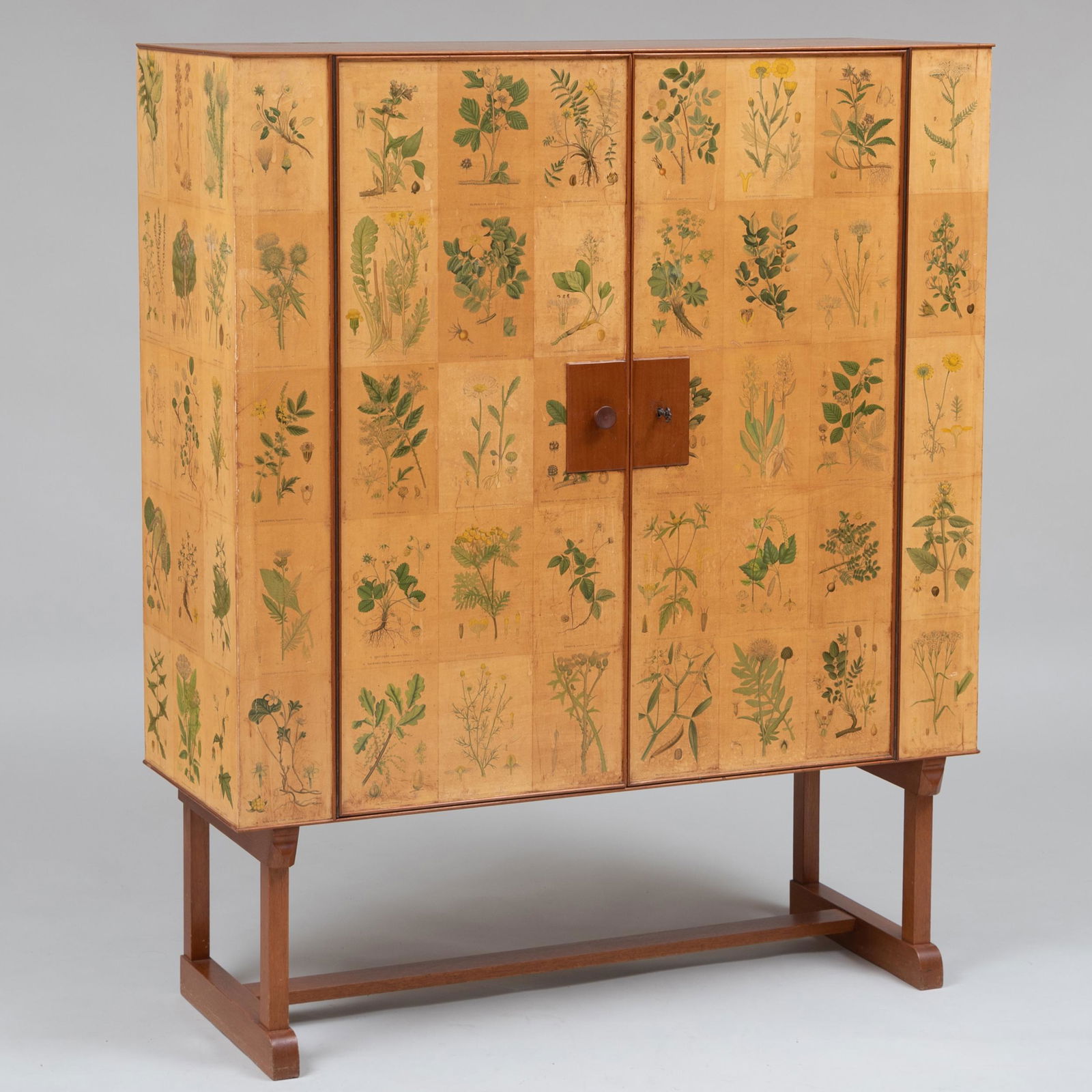 Josef Frank (1885-1967): 'Flora' Printed Paper and: Josef Frank (1885-1967): 'Flora' Printed Paper and Mahogany Cabinet Retailed by Svenskt Tenn, Stockholm, Sweden. Model 852. Label on the back from Bukowski's Auction, Stockholm. Opening to three shelv