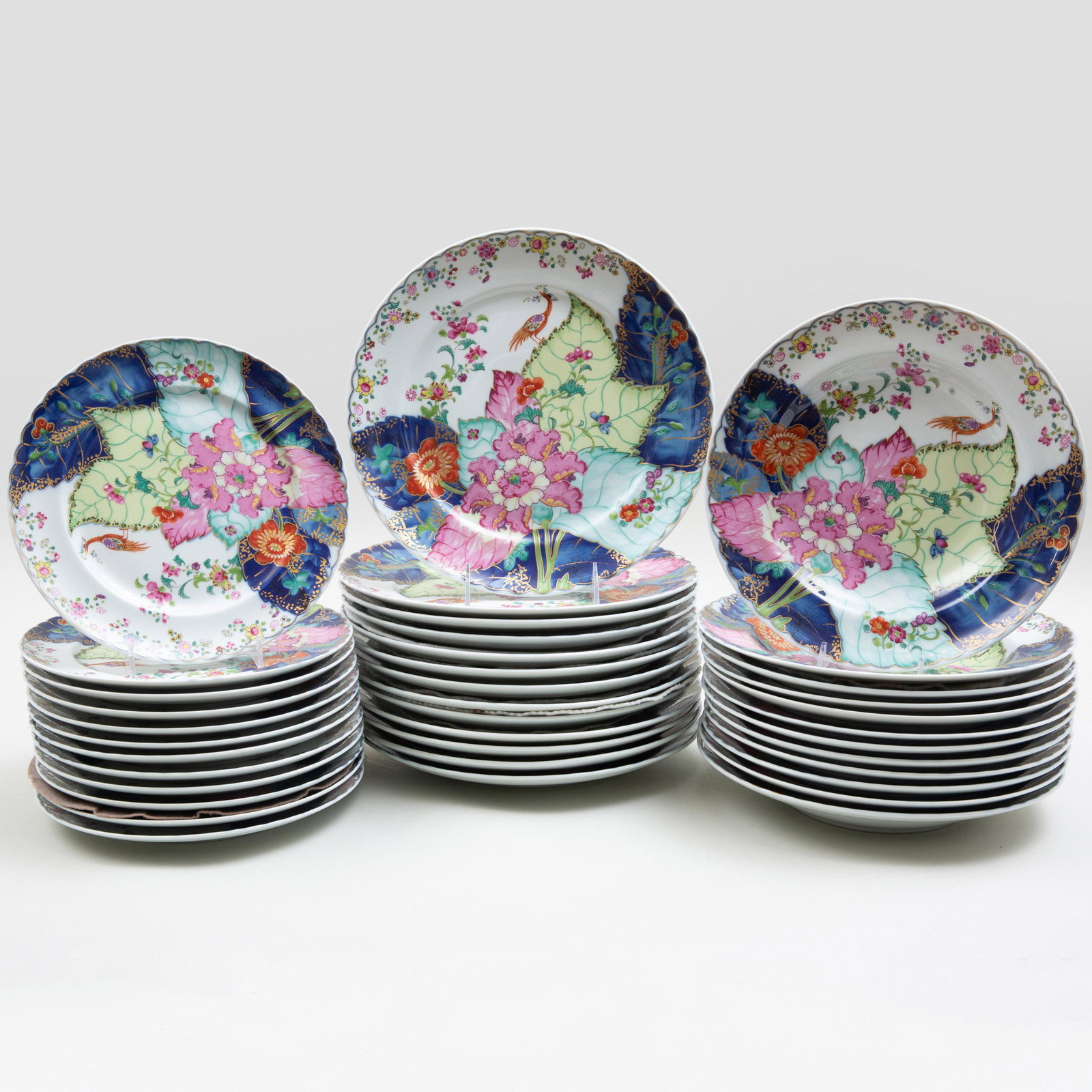 Mottahedeh Chinese Export Porcelain Part Service in the: Mottahedeh Chinese Export Porcelain Part Service in the 'Tobacco Leaf' Pattern Black and green printed mark. Comprising: Thirteen dinner plates Twelve soup plates Twelve dessert plates The dinner pl