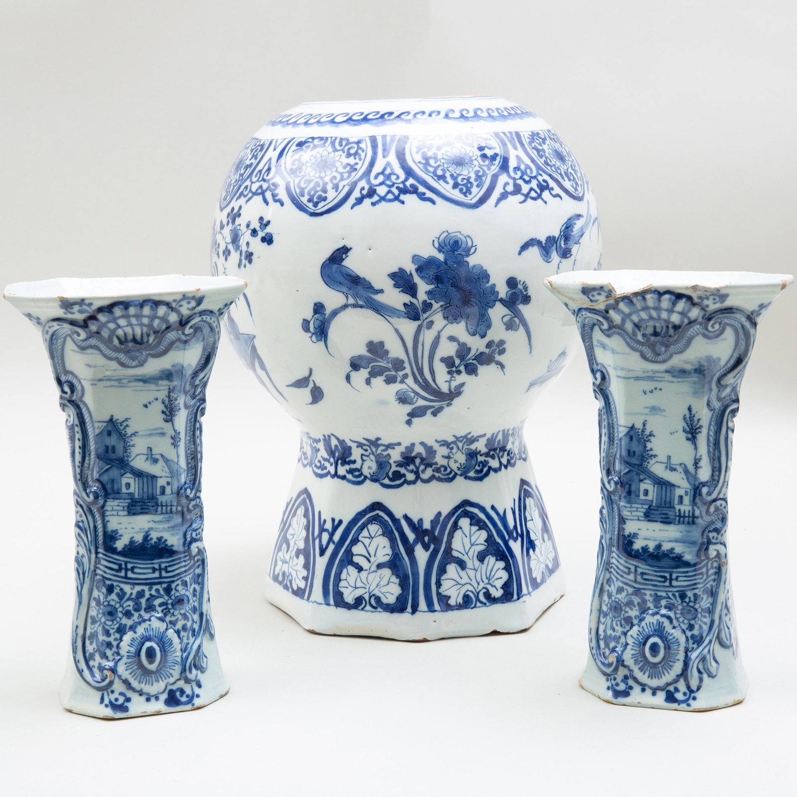 Three Dutch Delft Blue and White Vases: Three Dutch Delft Blue and White Vases Comprising: A baluster vase A pair of beaker vases The largest 13 x 7 3/4 in. diam. Selected Property from the Collection of Mr. and Mrs. Gutfreund