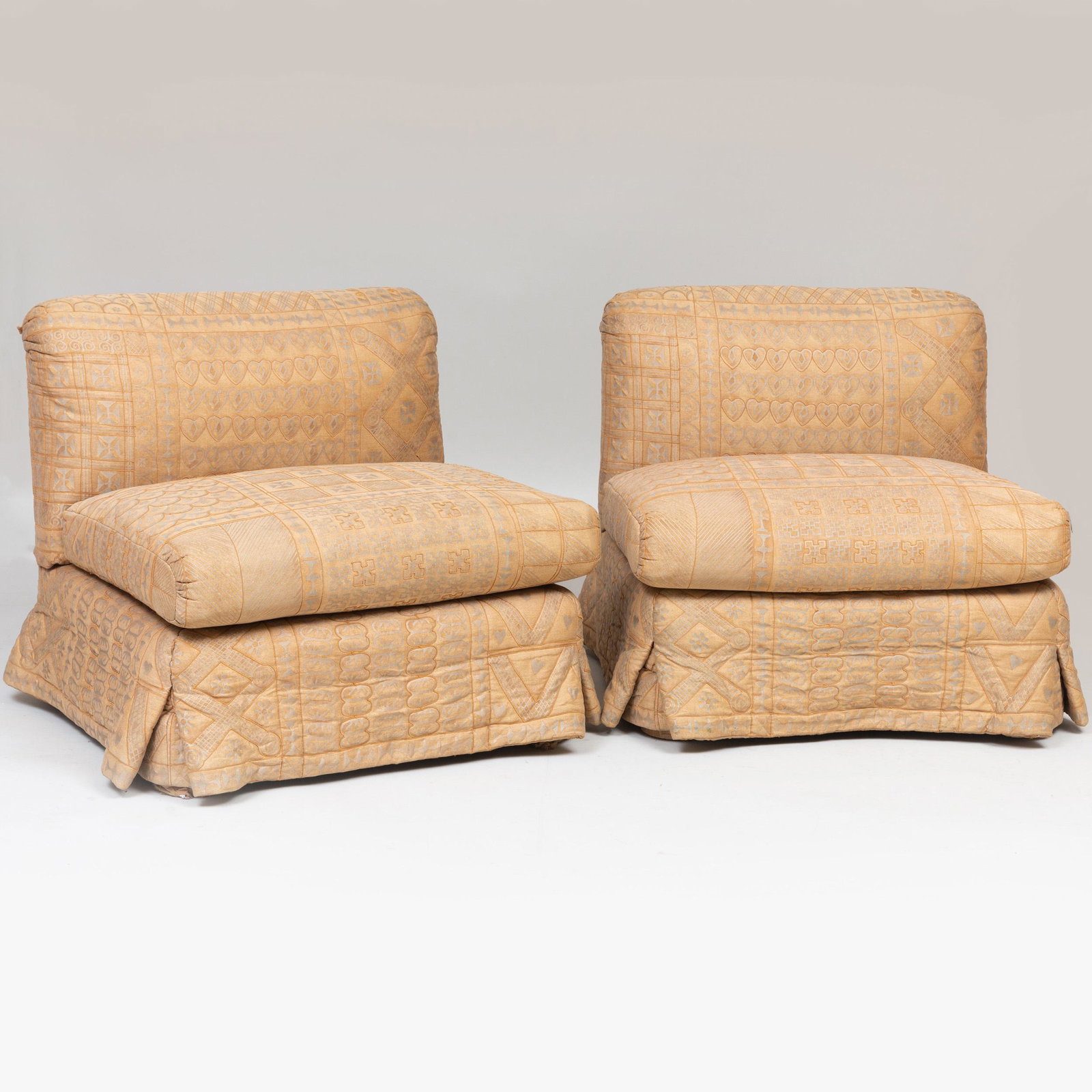 Pair of Large Embroidered Fortuny Upholstered Slipper: Pair of Large Embroidered Fortuny Upholstered Slipper Chairs, Designed by Mica Ertegun, MAC II Each fitted with a loose cushion. 29 x 30 x 32 1/2 in. Height of seat: 17 in. Selected Property from the 