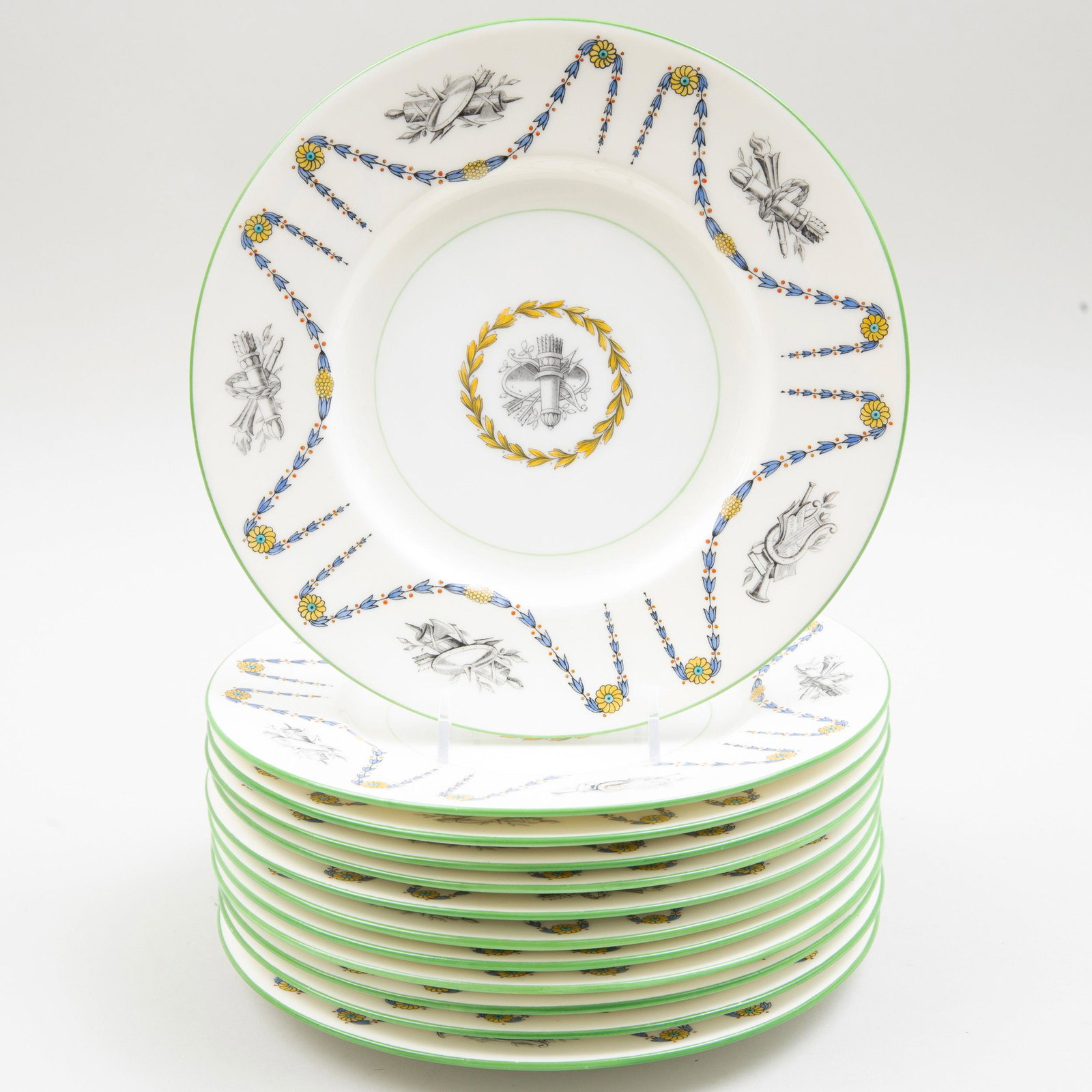 Set of Twelve Mintons Porcelain Soup Plates Decorated: Set of Twelve Mintons Porcelain Soup Plates Decorated with Trophies and Garlands Black printed mark. 8 7/8 in. diam. Selected Property from the Collection of Mr. and Mrs. Gutfreund