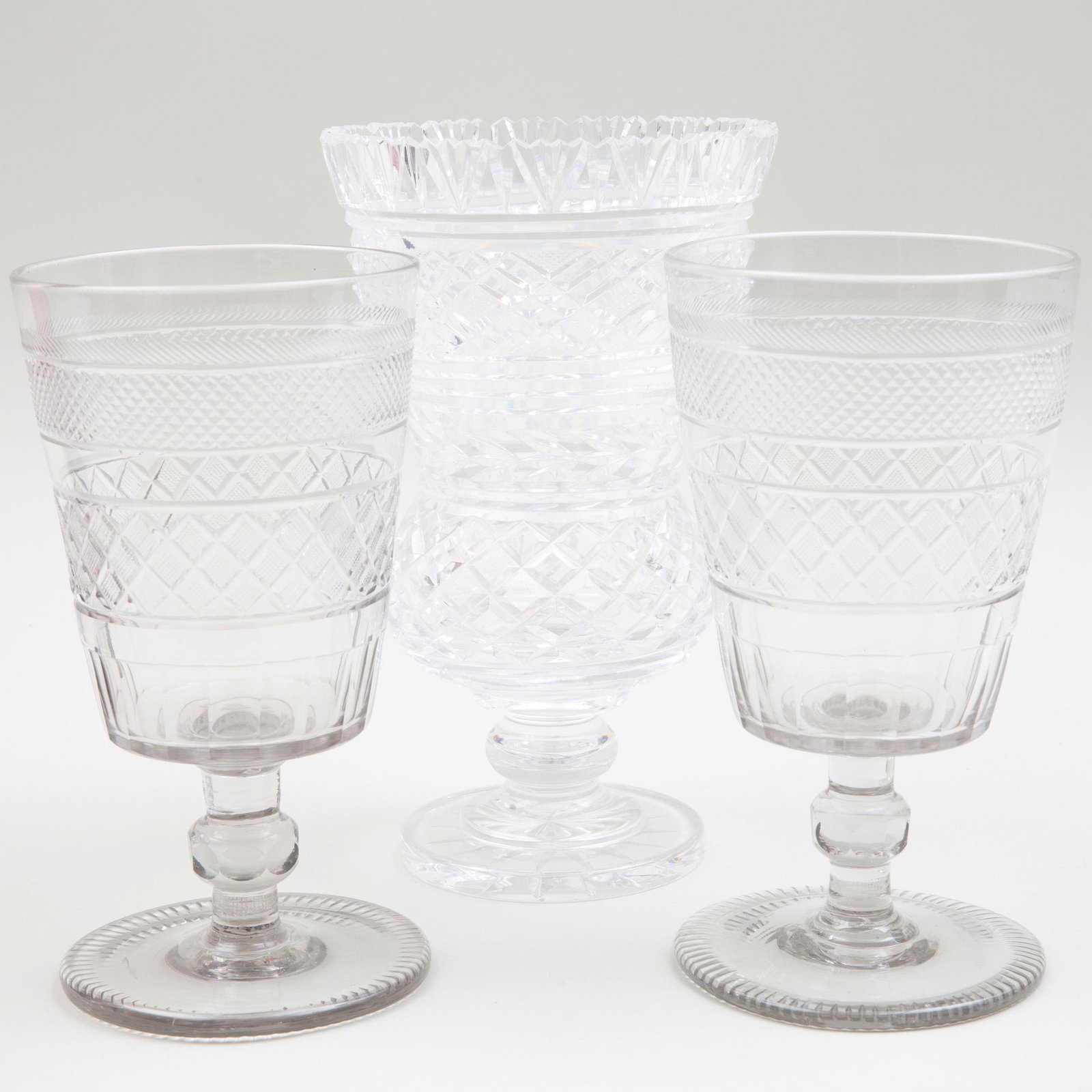Three English or Irish Glass Vases: Three English or Irish Glass Vases Together with an Anglo-Irish glass butter tub, cover and stand. The largest 10 1/2 in., (4 pcs). The butter tub Asprey's, London, sold as circa 1815. Selected Proper