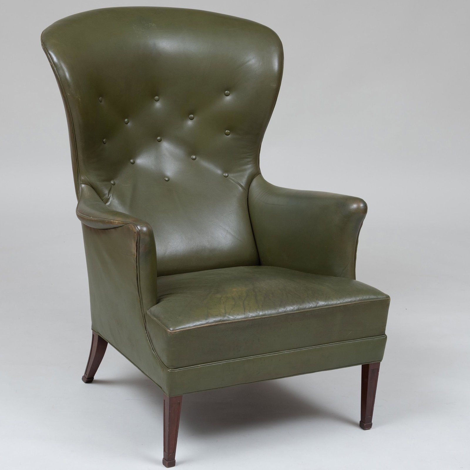 Danish Mahogany and Green Leather Upholstered Wing: Danish Mahogany and Green Leather Upholstered Wing Armchair, Attributed to Frits Henningsen Unmarked. 41 x 29 x 31 in. Selected Property from the Collection of Mr. and Mrs. Gutfreund