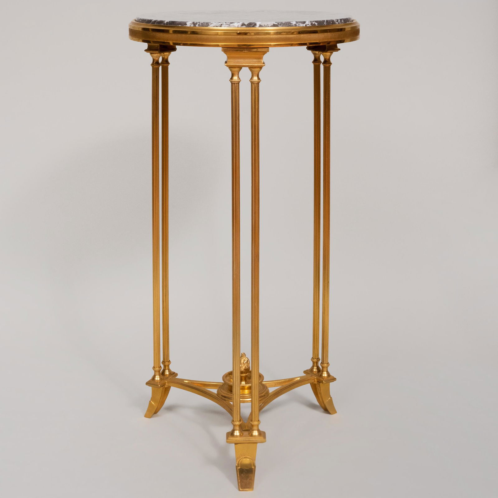 Louis XVI Style Gilt-Metal Guéridon: Louis XVI Style Gilt-Metal Guéridon Fitted with marble top. 28 x 14 1/2 in. diam. From a New York interior designed by Juan Pablo Molyneux.