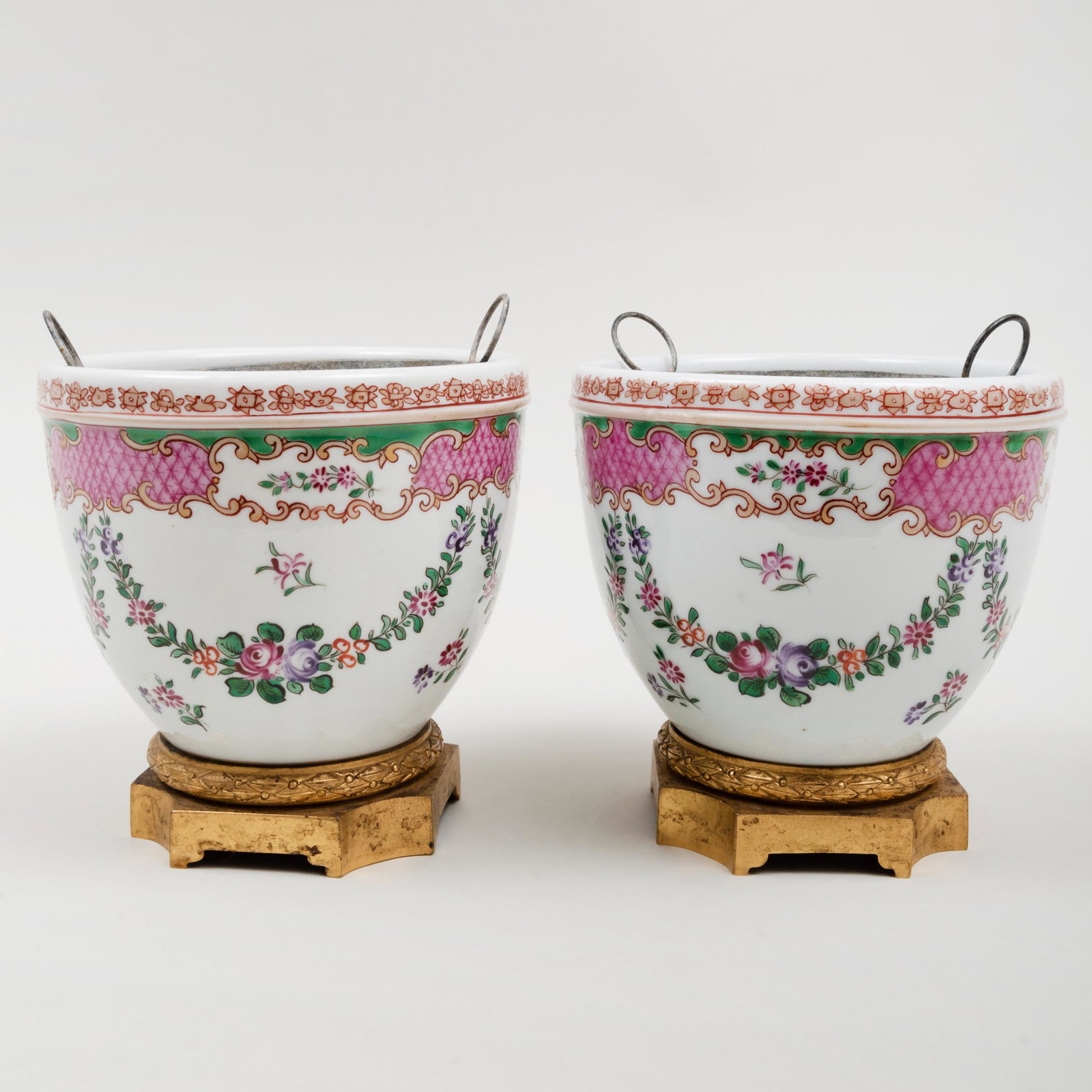 Pair of Chinese Export Style Porcelain: Pair of Chinese Export Style Porcelain Gilt-Metal-Mounted Jardinières With lead liners; together with an additional Chinese Export style jardinère with a faux armorial. The pair 5 1/2 x 5 5/8 in. di