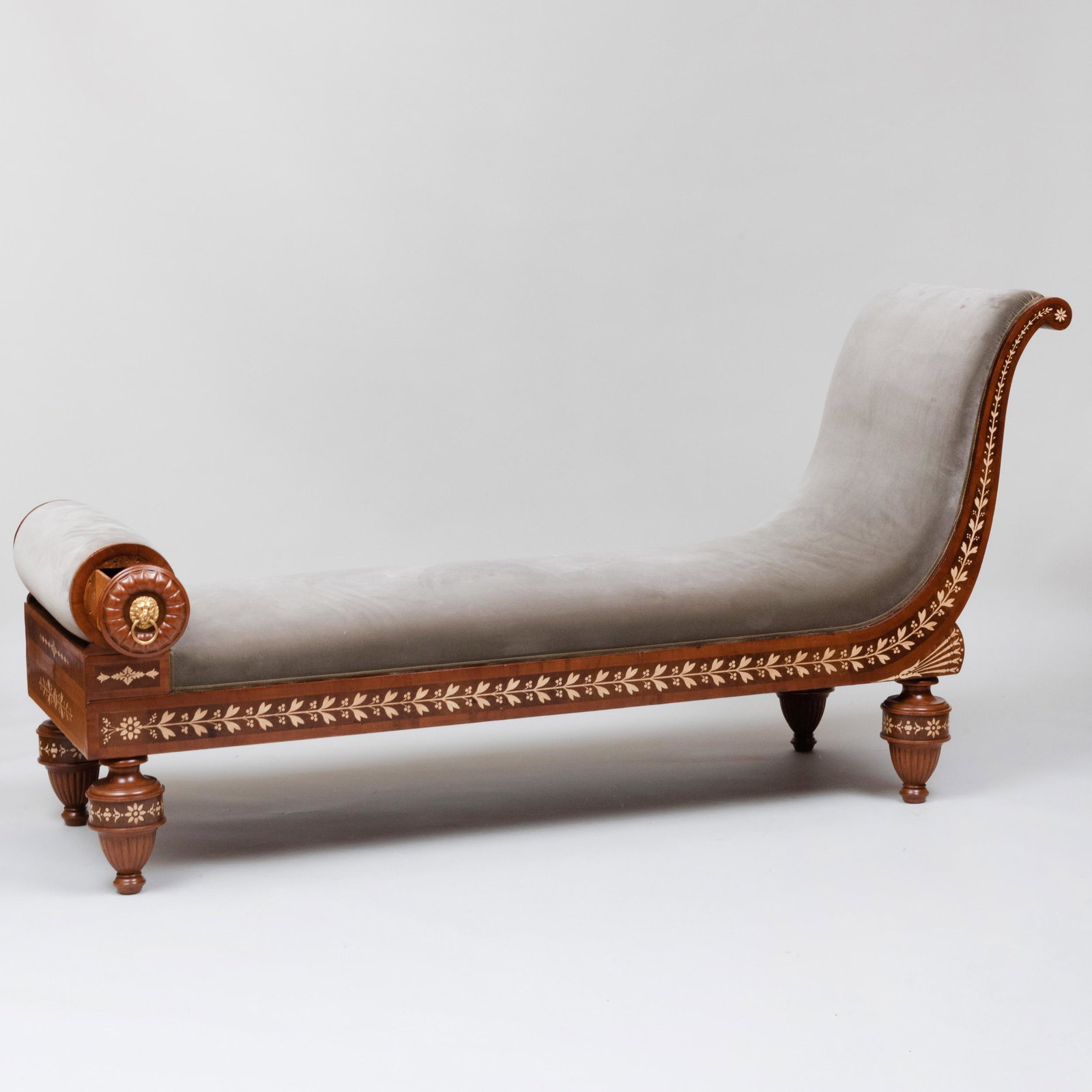 Italian Neoclassical Bone Inlaid Mahogany Chaise Lounge: Italian Neoclassical Bone Inlaid Mahogany Chaise Lounge Fitted with one drawer on the circular upholstered end. 39 x 6 ft. 7 in. x 25 1/4 in. Bernd Goeckler Antiques, NY. The Collection of Michae