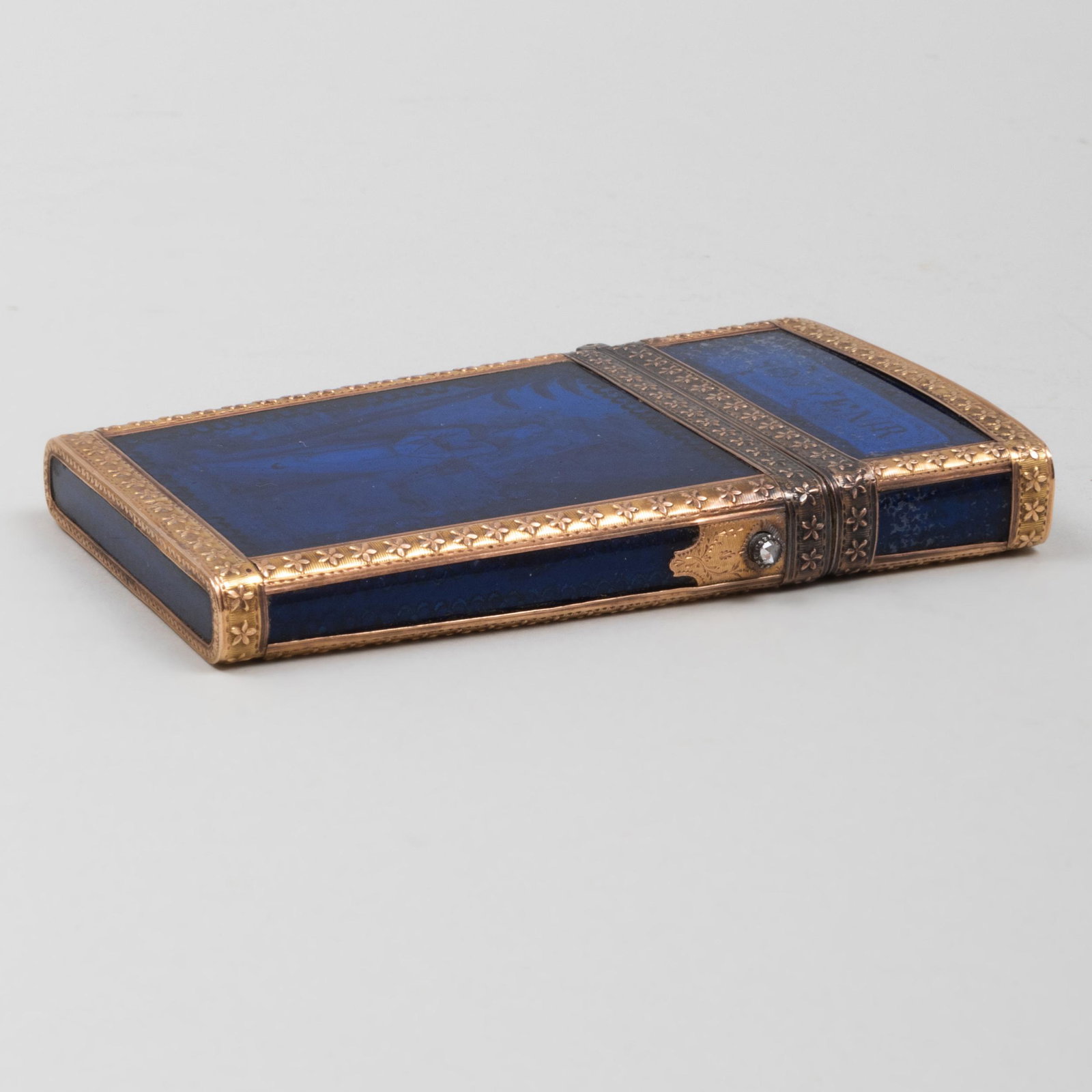 French Gold-Mounted Blue Glass and Enamel 'Aide: French Gold-Mounted Blue Glass and Enamel 'Aide Memoire' Indistinctly marked; inscribed 'Souvenir' and 'D'Amitié' above scenes with courting couples. 3 3/8 in. Property from the Collection of Ezra & 