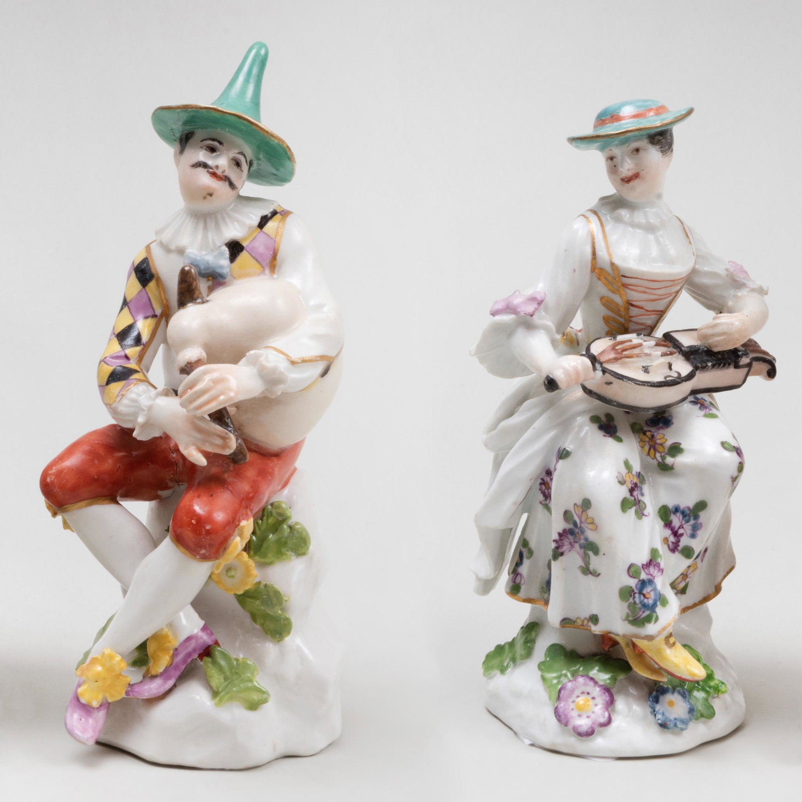 Assembled Pair of Meissen Porcelain Figures of: Assembled Pair of Meissen Porcelain Figures of Harlequin and Columbine Modeled by Johann Joachim Kändler. The larger 5 ¾ in., the smaller 5 ¼ in.